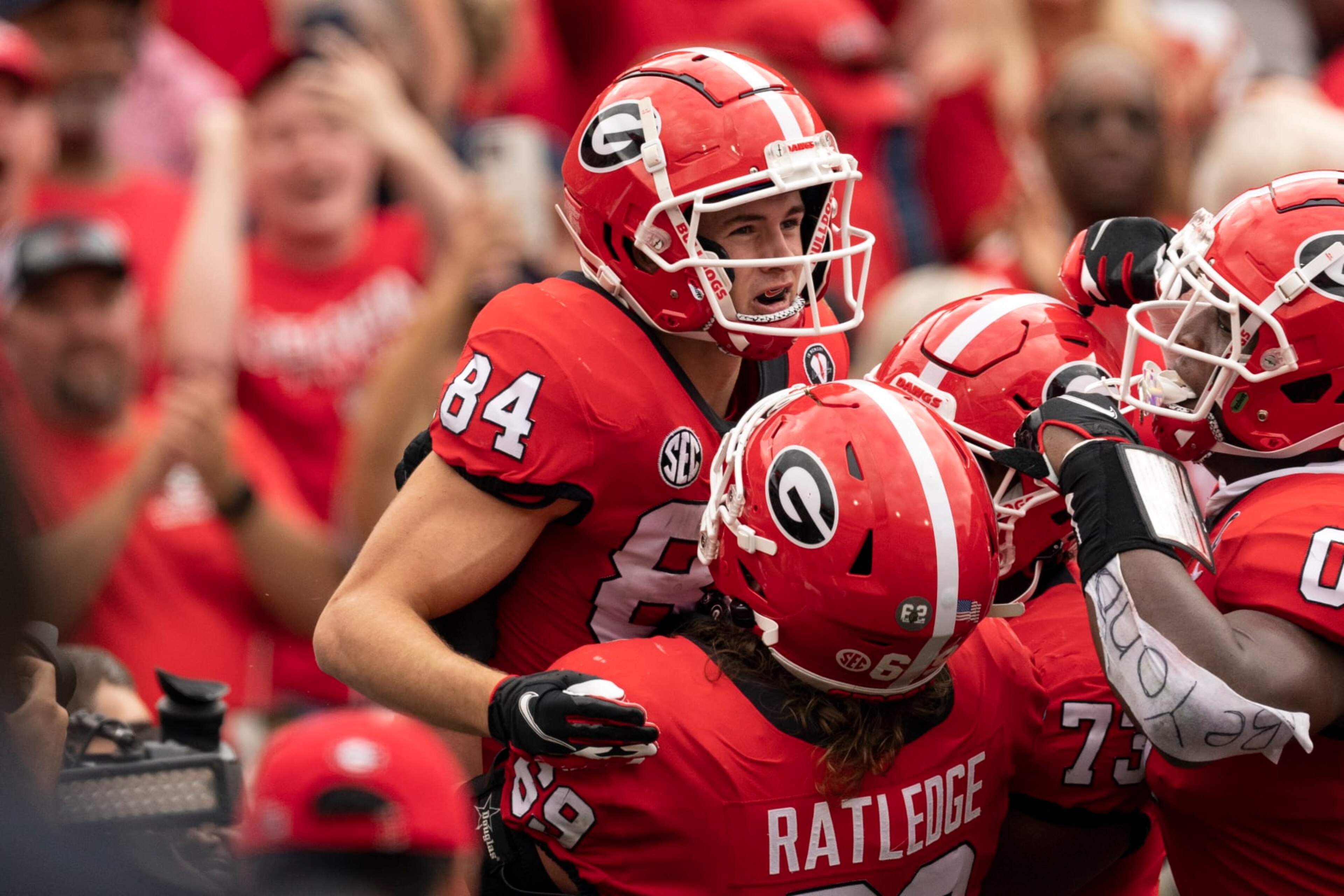 Georgia wide receiver Ladd McConkey (84) celebrates a touchdown catch with teammates during the first half of an NCAA college football game against Tennessee, Saturday, Nov. 5, 2022, in Athens, Ga. (AP Photo/John Bazemore) Georgia wide receiver Ladd McConkey (84) celebrates a touchdown catch with teammates during the first half of an NCAA college football game against Tennessee, Saturday, Nov. 5, 2022, in Athens, Ga. (AP Photo/John Bazemore)