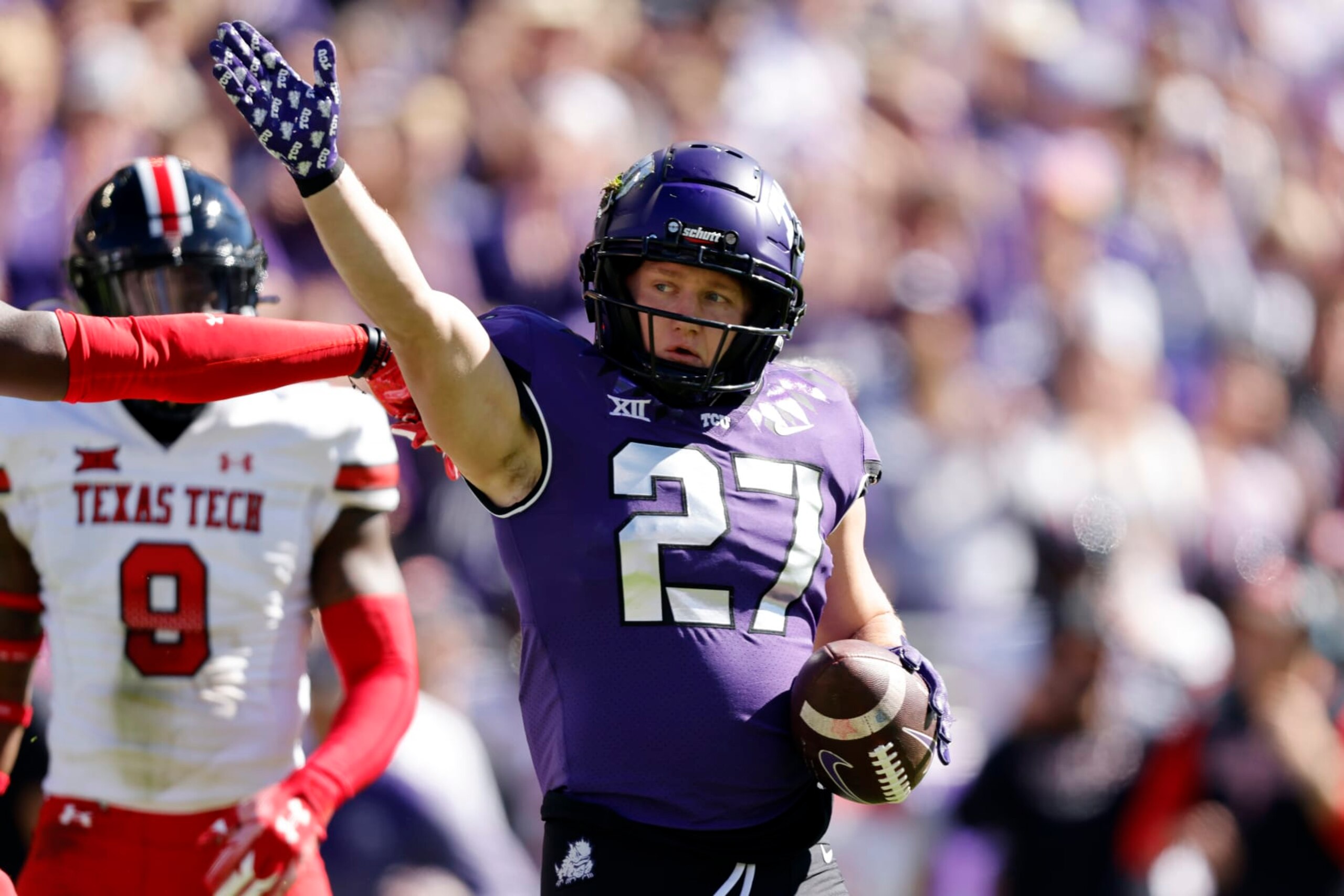 TCU wide receiver Gunnar Henderson (27) signals first down during the first half of an NCAA college football game against Texas Tech, Saturday, Nov. 5, 2022, in Fort Worth, Texas. (AP Photo/Ron Jenkins)