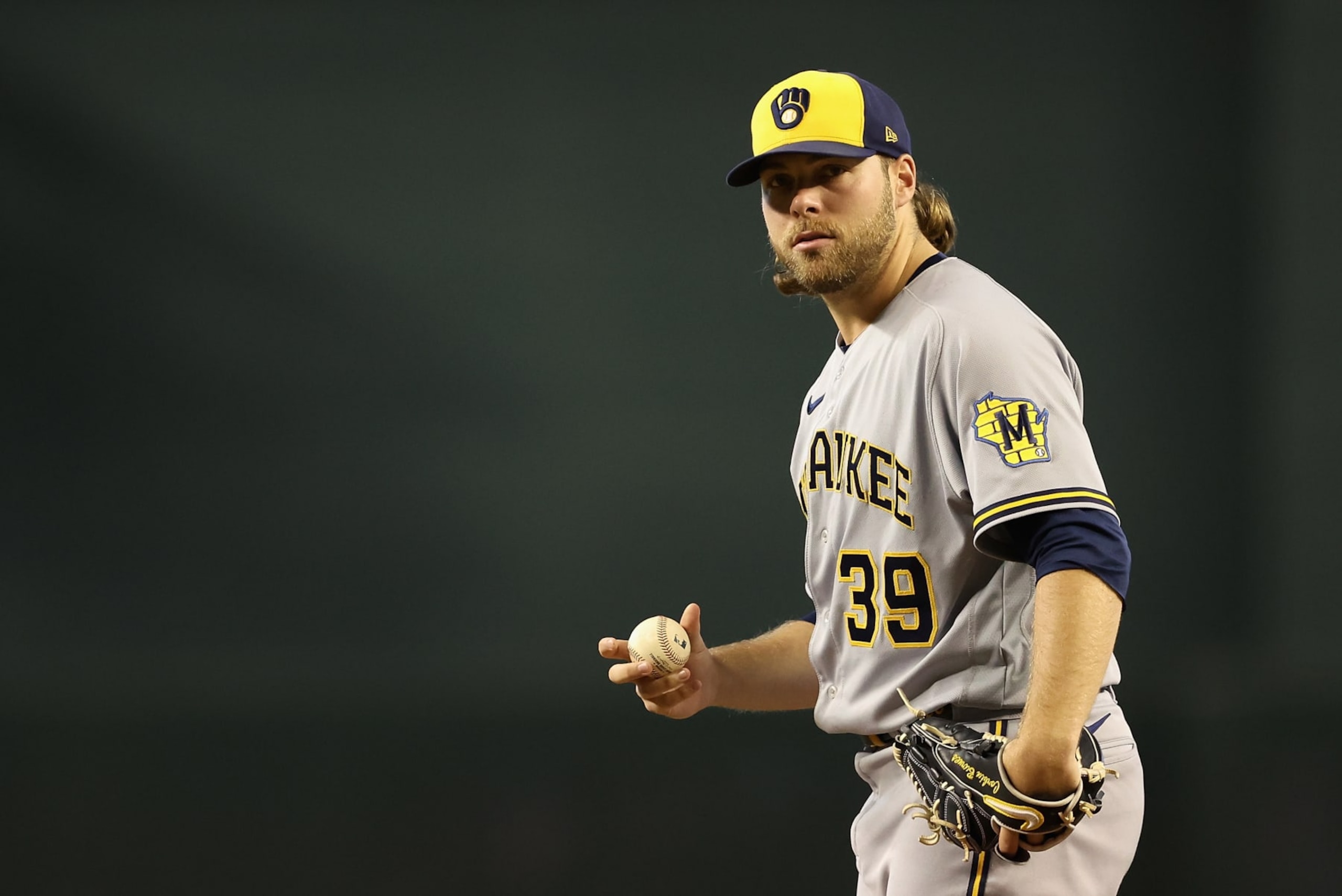 PHOENIX, ARIZONA - SEPTEMBER 03: Starting pitcher Corbin Burnes #39 of the Milwaukee Brewers throws a warm-up pitch during the first inning of the MLB game against the Arizona Diamondbacks at Chase Field on September 03, 2022 in Phoenix, Arizona. (Photo by Christian Petersen/Getty Images)