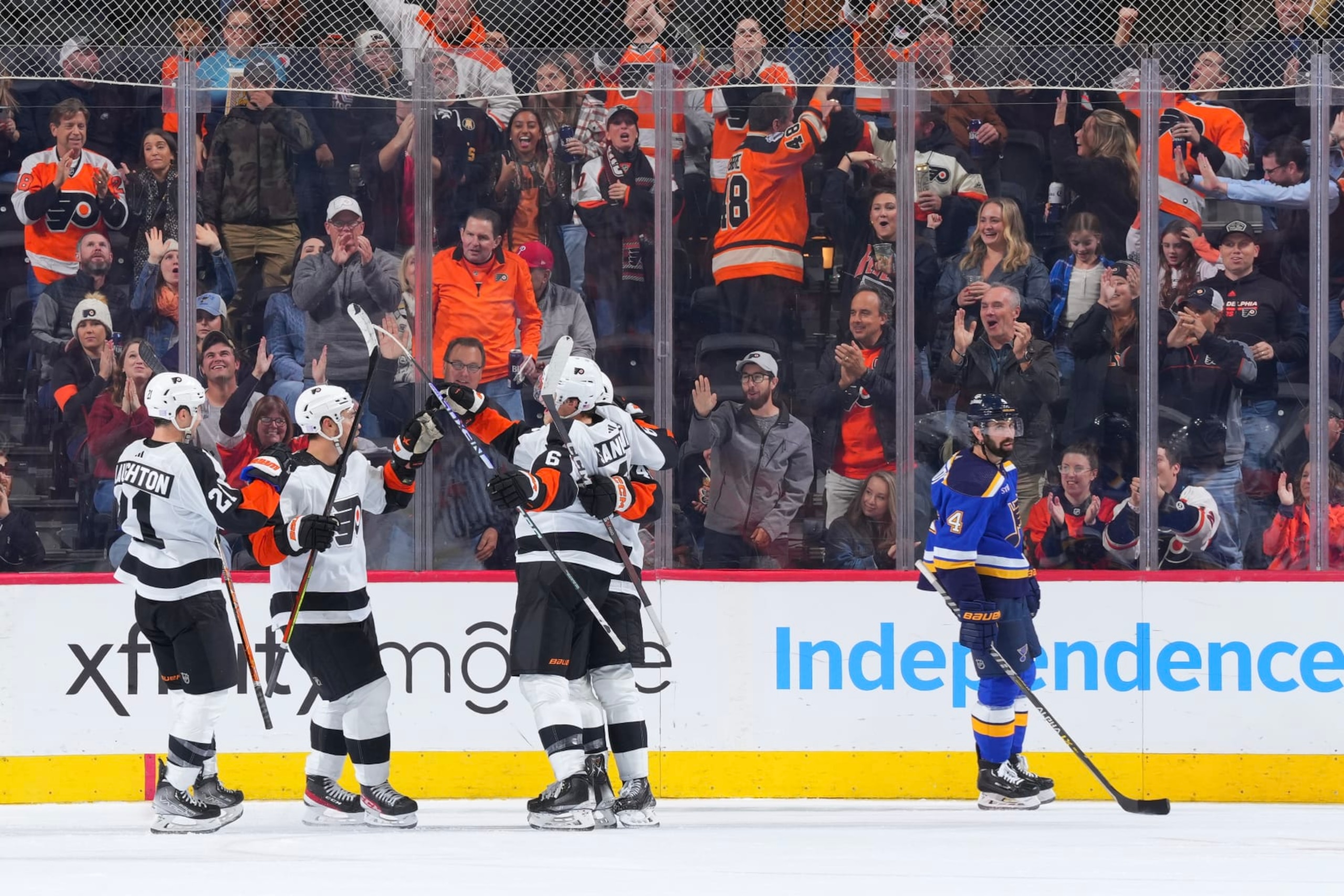 PHILADELPHIA, PA - NOVEMBER 08: Scott Laughton #21, Ivan Provorov #9, Noah Cates #49, and Travis Sanheim #6 of the Philadelphia Flyers react in front of Nick Leddy #4 of the St. Louis Blues after a goal by Noah Cates in the second period at the Wells Fargo Center on November 8, 2022 in Philadelphia, Pennsylvania. (Photo by Mitchell Leff/NHLI via Getty Images) PHILADELPHIA, PA - NOVEMBER 08: Scott Laughton #21, Ivan Provorov #9, Noah Cates #49, and Travis Sanheim #6 of the Philadelphia Flyers react in front of Nick Leddy #4 of the St. Louis Blues after a goal by Noah Cates in the second period at the Wells Fargo Center on November 8, 2022 in Philadelphia, Pennsylvania. (Photo by Mitchell Leff/NHLI via Getty Images)