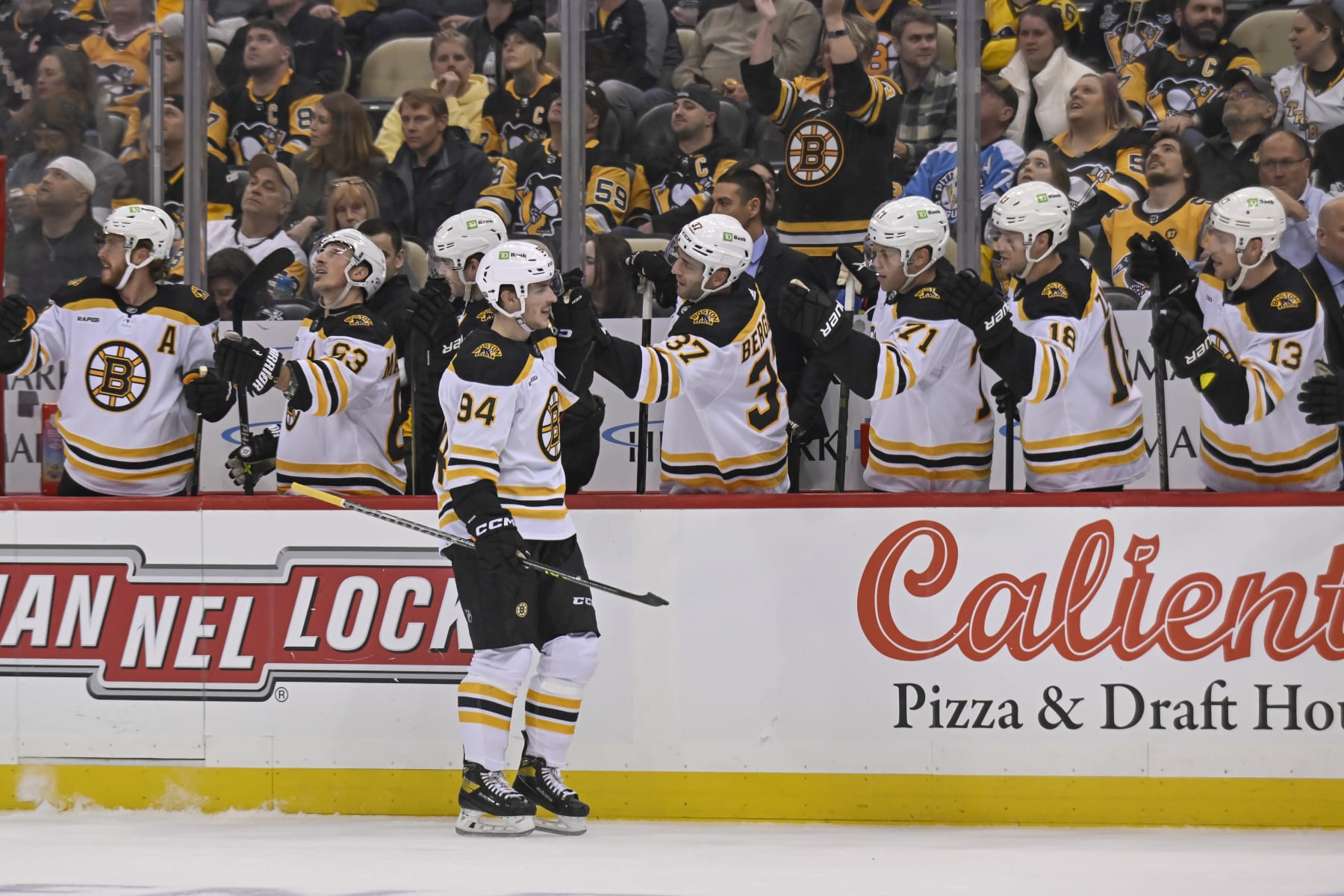 PITTSBURGH, PA - NOVEMBER 01: Boston Bruins Center Jakub Lauko (94) celebrates his goal with the bench during the first period in the NHL game between the Pittsburgh Penguins and the Boston Bruins on November 1, 2022, at PPG Paints Arena in Pittsburgh, PA. (Photo by Jeanine Leech/Icon Sportswire via Getty Images)