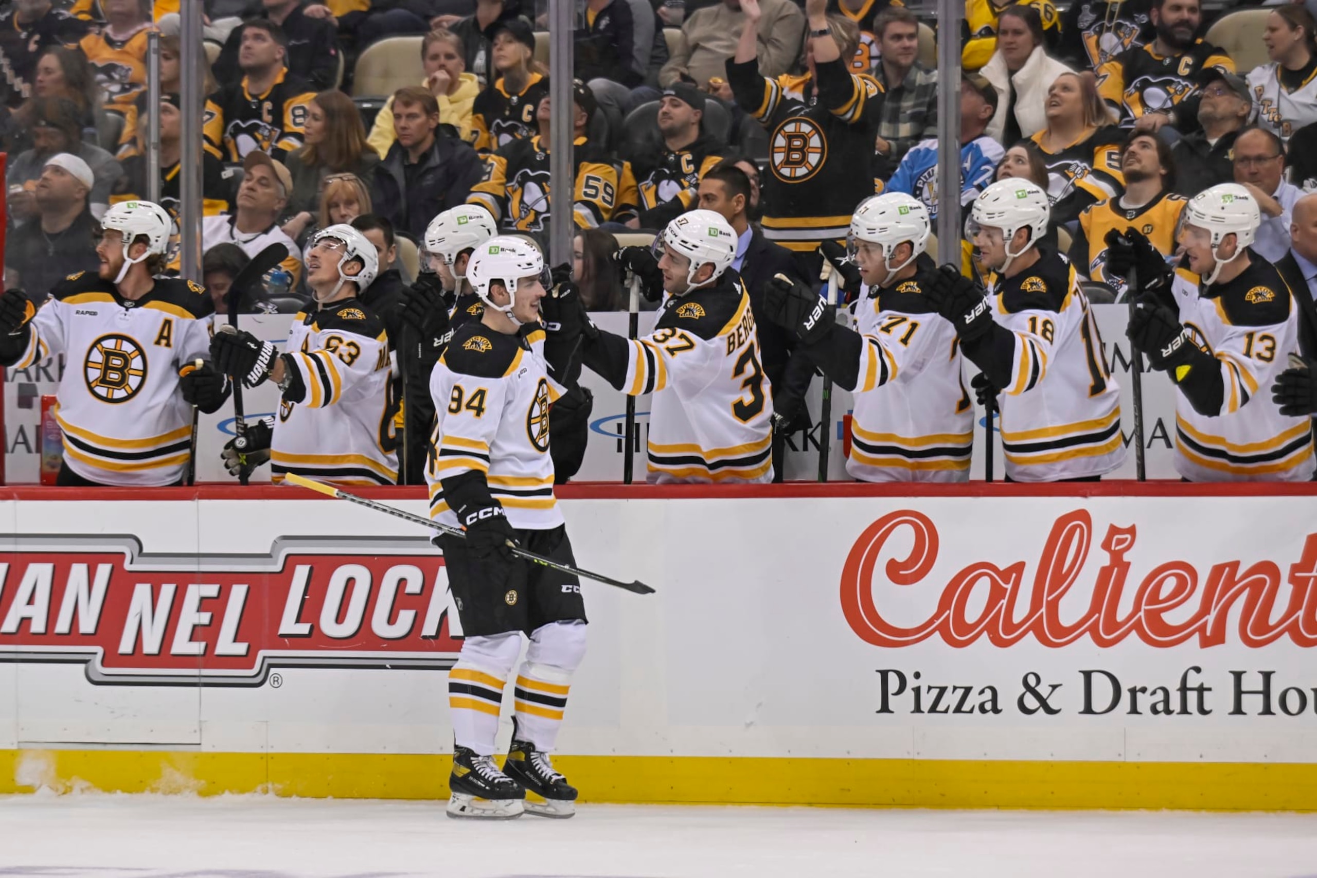 PITTSBURGH, PA - NOVEMBER 01: Boston Bruins Center Jakub Lauko (94) celebrates his goal with the bench during the first period in the NHL game between the Pittsburgh Penguins and the Boston Bruins on November 1, 2022, at PPG Paints Arena in Pittsburgh, PA. (Photo by Jeanine Leech/Icon Sportswire via Getty Images)