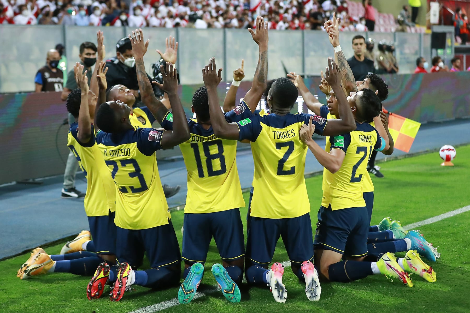 LIMA, PERU - FEBRUARY 01: Michael Estrada of Ecuador celebrates with teammates after scoring the first goal of his team during a match between Peru and Ecuador as part of FIFA World Cup Qatar 2022 Qualifiers at National Stadium on February 01, 2022 in Lima, Peru. (Photo by Daniel Apuy/Getty Images)