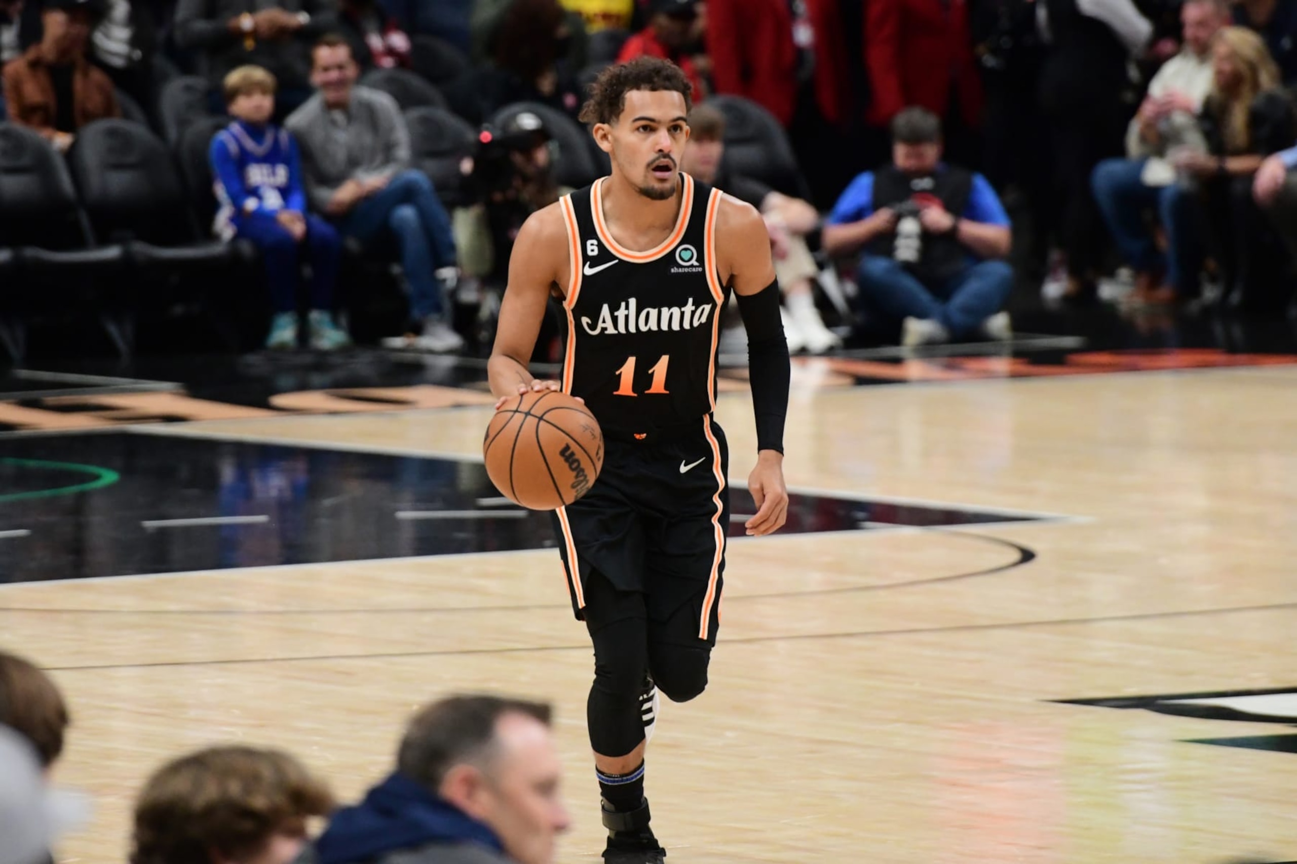 ATLANTA, GA - NOVEMBER 10: Trae Young #11 of the Atlanta Hawks handles the ball during the game against the Philadelphia 76ers on Novmeber 10, 2022 at State Farm Arena in Atlanta, Georgia.  NOTE TO USER: User expressly acknowledges and agrees that, by downloading and/or using this Photograph, user is consenting to the terms and conditions of the Getty Images License Agreement. Mandatory Copyright Notice: Copyright 2022 NBAE (Photo by Scott Cunningham/NBAE via Getty Images)