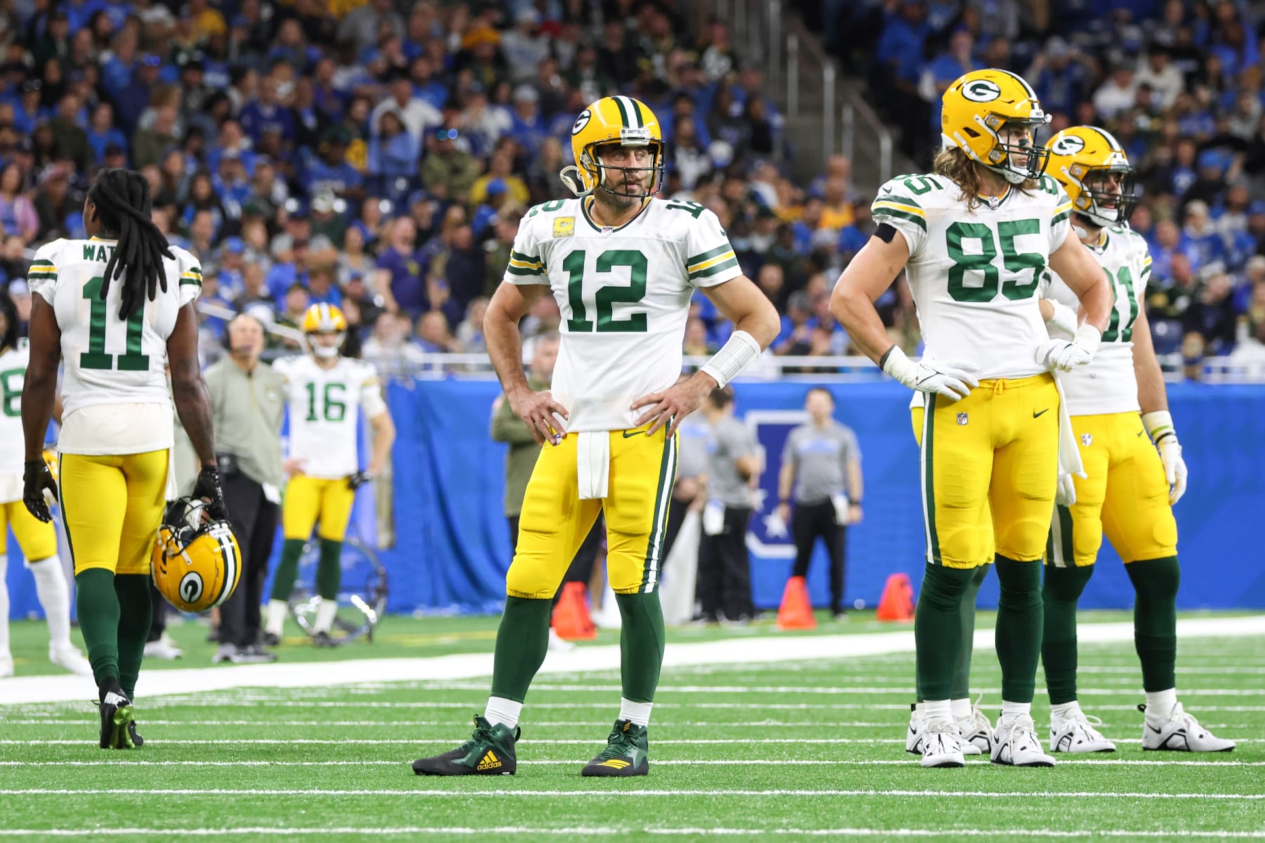 DETROIT, MI - NOVEMBER 06: Green Bay Packers quarterback Aaron Rodgers (12) stands with his hands on his hips as he waits for a replay ruling during the second quarter of an NFL regular season football game between the Green Bay Packers and the Detroit Lions on November 6, 2022 at Ford Field in Detroit, Michigan. (Photo by Scott W. Grau/Icon Sportswire via Getty Images) DETROIT, MI - NOVEMBER 06: Green Bay Packers quarterback Aaron Rodgers (12) stands with his hands on his hips as he waits for a replay ruling during the second quarter of an NFL regular season football game between the Green Bay Packers and the Detroit Lions on November 6, 2022 at Ford Field in Detroit, Michigan. (Photo by Scott W. Grau/Icon Sportswire via Getty Images)