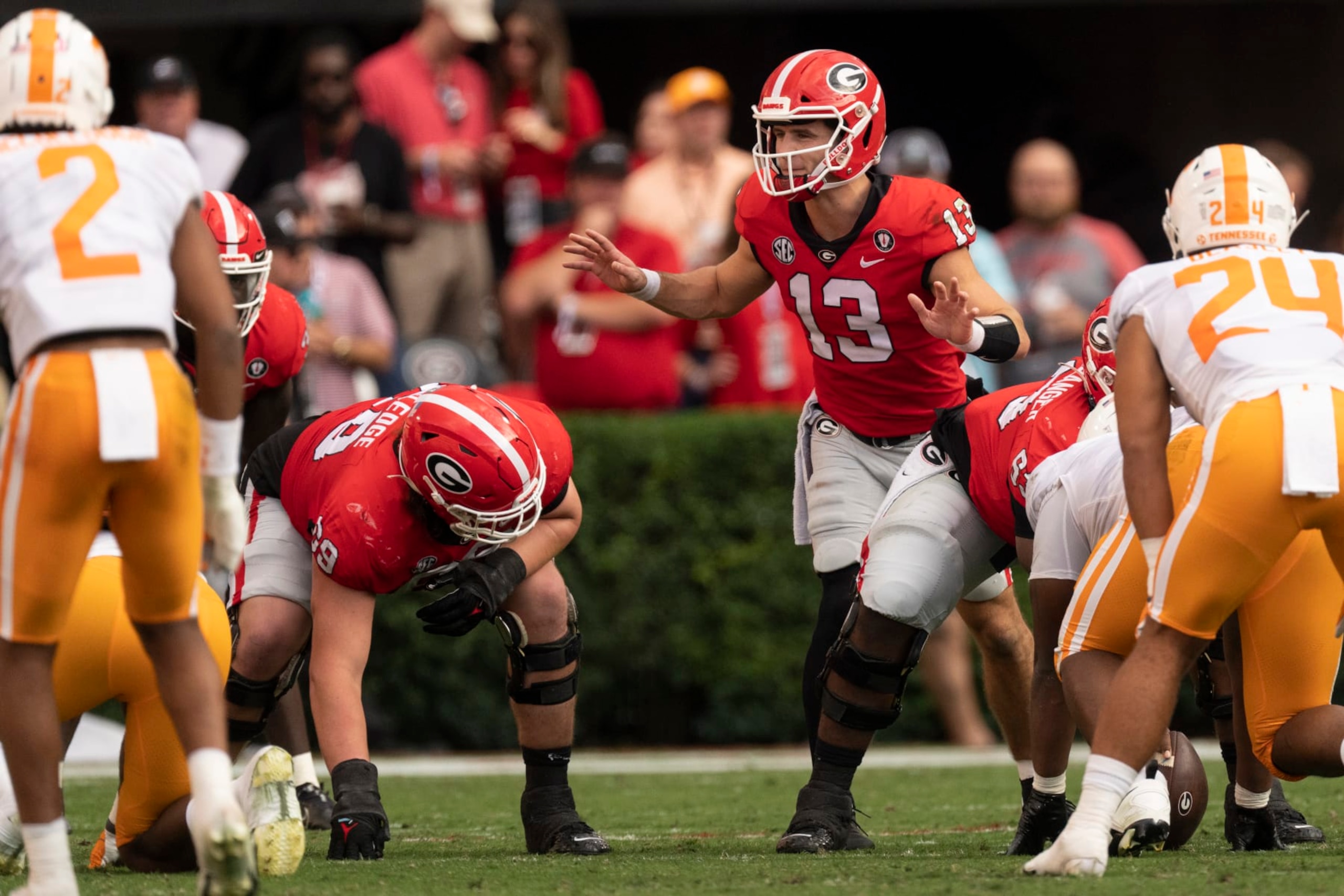 Georgia quarterback Stetson Bennett (13) calls the signals during the first half of an NCAA college football game against Tennessee Saturday, Nov. 5, 2022 in Athens, Ga. (AP Photo/John Bazemore)