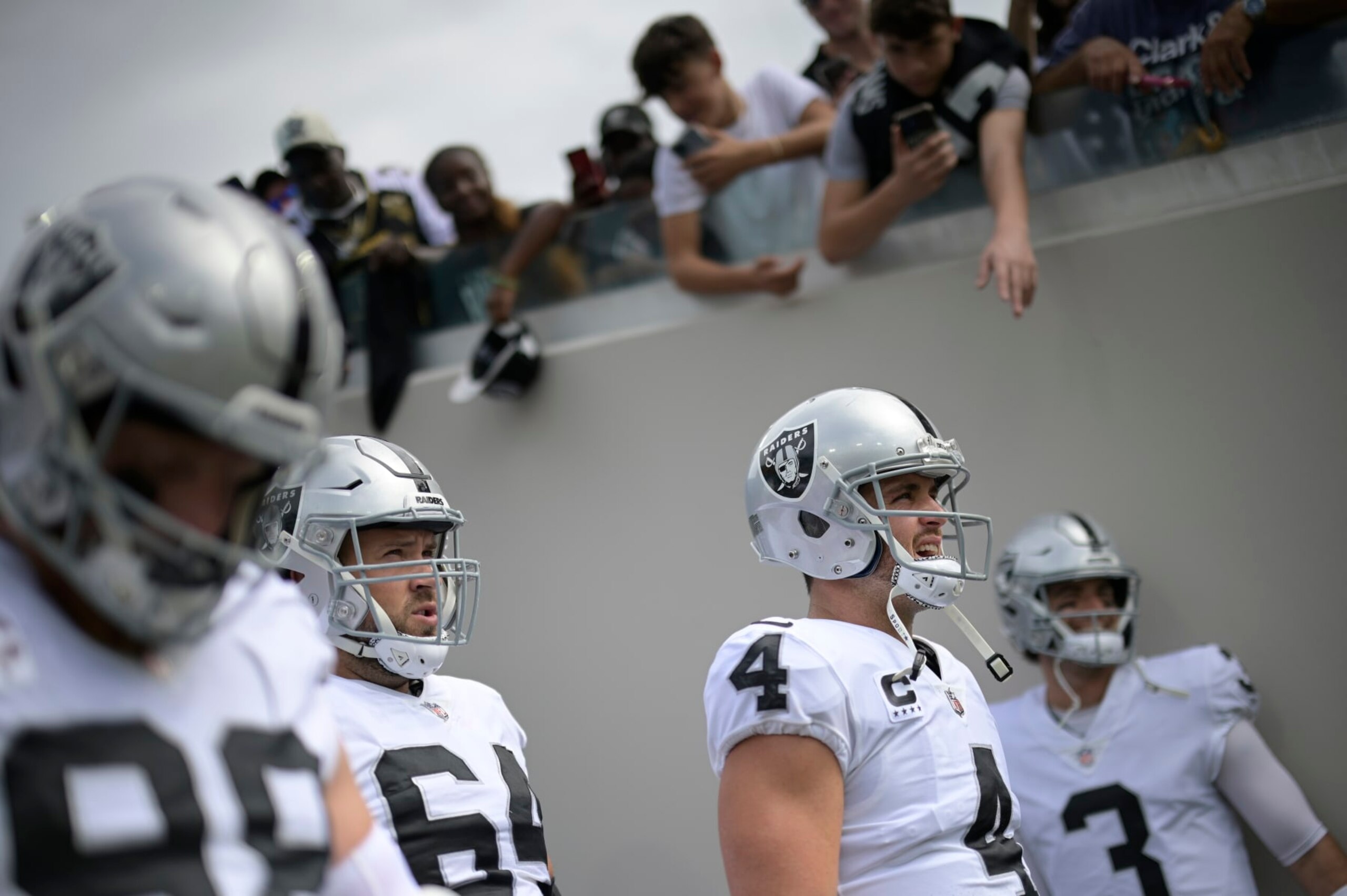 Las Vegas Raiders quarterback Derek Carr (4) and guard Alex Bars (64) wait to take the field before an NFL football game against the Jacksonville Jaguars, Sunday, Nov. 6, 2022, in Jacksonville, Fla. (AP Photo/Phelan M. Ebenhack) Las Vegas Raiders quarterback Derek Carr (4) and guard Alex Bars (64) wait to take the field before an NFL football game against the Jacksonville Jaguars, Sunday, Nov. 6, 2022, in Jacksonville, Fla. (AP Photo/Phelan M. Ebenhack)