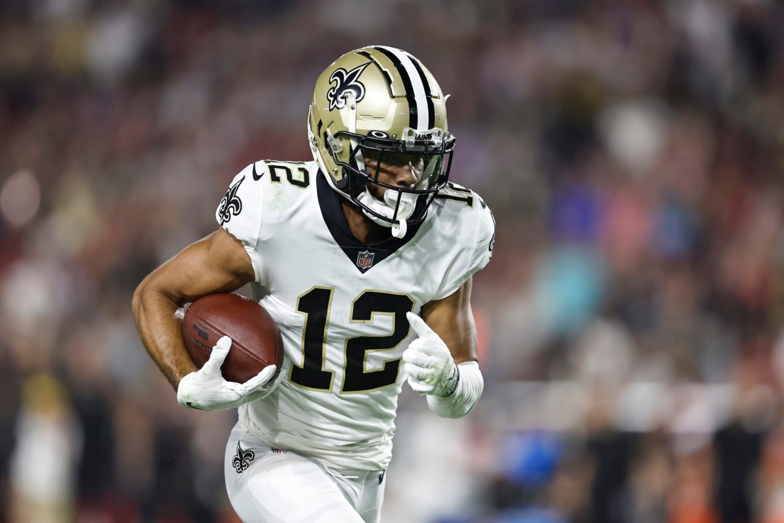 GLENDALE, ARIZONA - OCTOBER 20: Chris Olave #12 of the New Orleans Saints runs during an NFL football game between the Arizona Cardinals and the New Orleans Saints at State Farm Stadium on October 20, 2022 in Glendale, Arizona. (Photo by Michael Owens/Getty Images) GLENDALE, ARIZONA - OCTOBER 20: Chris Olave #12 of the New Orleans Saints runs during an NFL football game between the Arizona Cardinals and the New Orleans Saints at State Farm Stadium on October 20, 2022 in Glendale, Arizona. (Photo by Michael Owens/Getty Images)