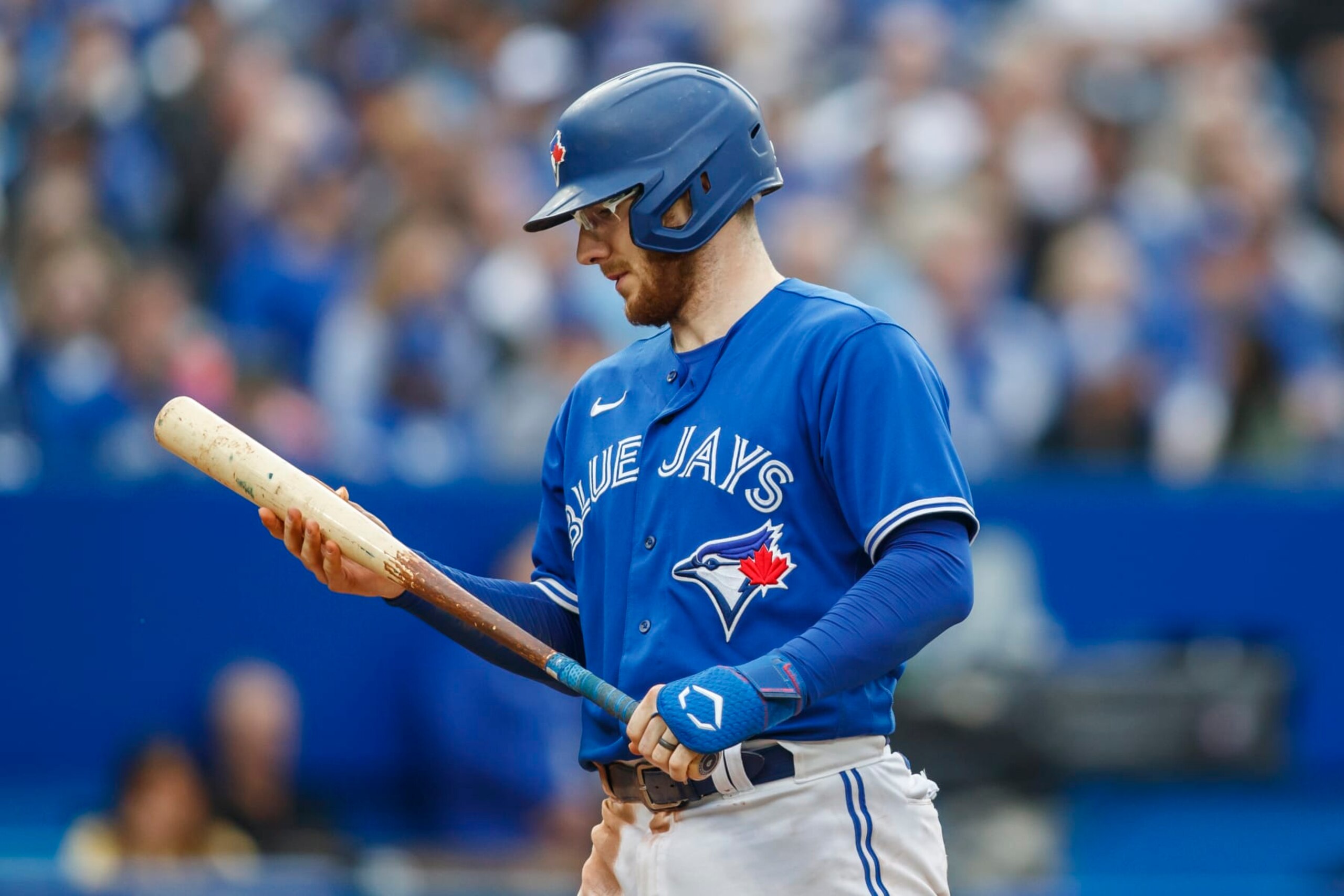TORONTO, ON - OCTOBER 01: Danny Jansen #9 of the Toronto Blue Jays looks at his bat before batting in the seventh inning of their MLB game against the Boston Red Sox at Rogers Centre on October 1, 2022 in Toronto, Canada. (Photo by Cole Burston/Getty Images) TORONTO, ON - OCTOBER 01: Danny Jansen #9 of the Toronto Blue Jays looks at his bat before batting in the seventh inning of their MLB game against the Boston Red Sox at Rogers Centre on October 1, 2022 in Toronto, Canada. (Photo by Cole Burston/Getty Images)