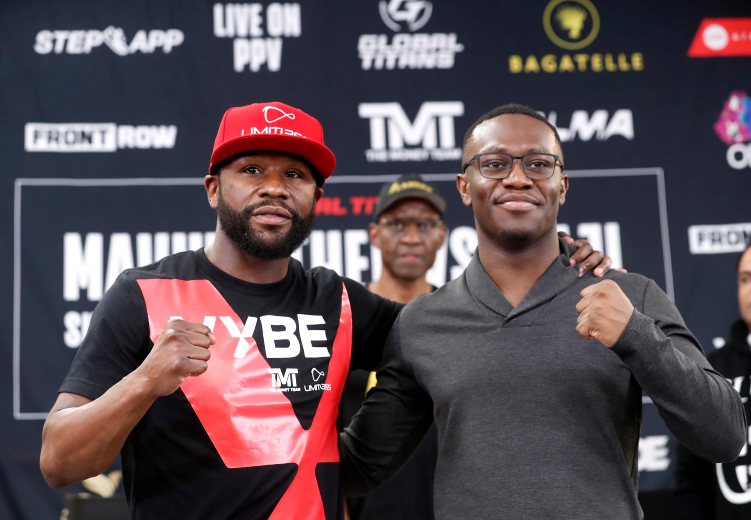LAS VEGAS, NEVADA - OCTOBER 13: Floyd Mayweather Jr. (L) and Deji Olatunji pose during a news conference at the Mayweather Boxing Club on October 13, 2022 in Las Vegas, Nevada. Mayweather is scheduled to fight Olatunji in an exhibition match in Dubai on November 13, 2022. (Photo by Steve Marcus/Getty Images) LAS VEGAS, NEVADA - OCTOBER 13: Floyd Mayweather Jr. (L) and Deji Olatunji pose during a news conference at the Mayweather Boxing Club on October 13, 2022 in Las Vegas, Nevada. Mayweather is scheduled to fight Olatunji in an exhibition match in Dubai on November 13, 2022. (Photo by Steve Marcus/Getty Images)