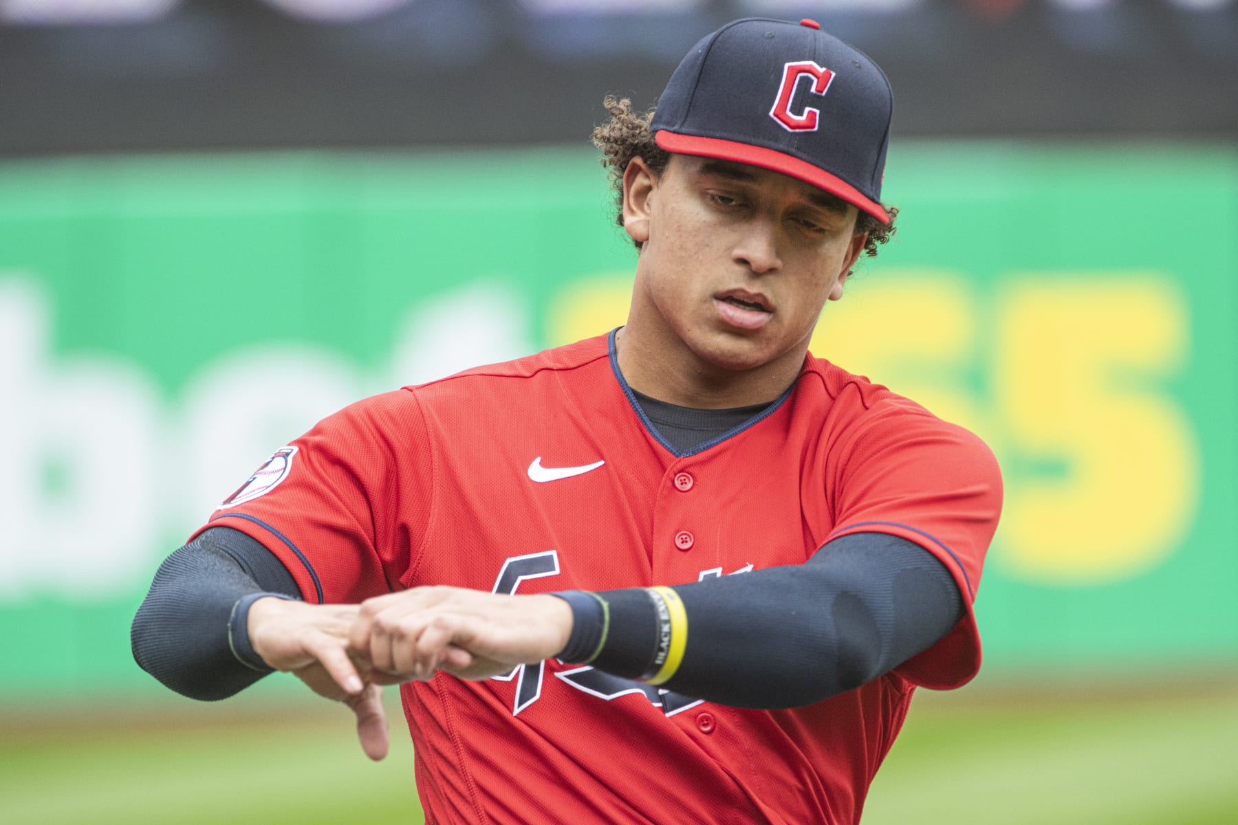 Cleveland Guardians' Bo Naylor warms up before a baseball game against the Kansas City Royals in Cleveland, Sunday, Oct. 2, 2022. (AP Photo/Phil Long)