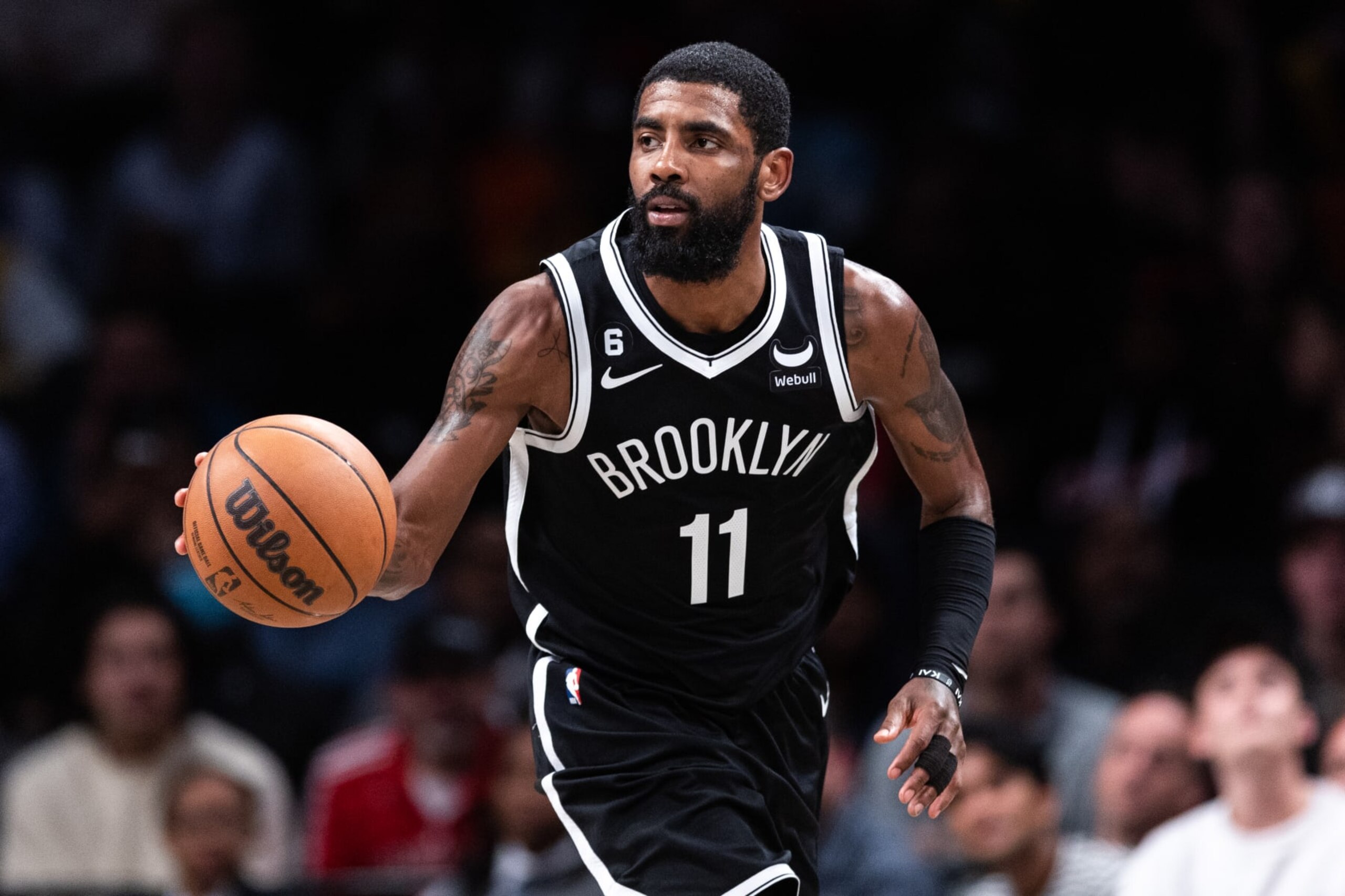 NEW YORK, NEW YORK - NOVEMBER 01: Kyrie Irving #11 of the Brooklyn Nets looks brings the ball up the court during the fourth quarter of the game against the Chicago Bulls at Barclays Center on November 01, 2022 in New York City. NOTE TO USER: User expressly acknowledges and agrees that, by downloading and or using this photograph, User is consenting to the terms and conditions of the Getty Images License Agreement. (Photo by Dustin Satloff/Getty Images)