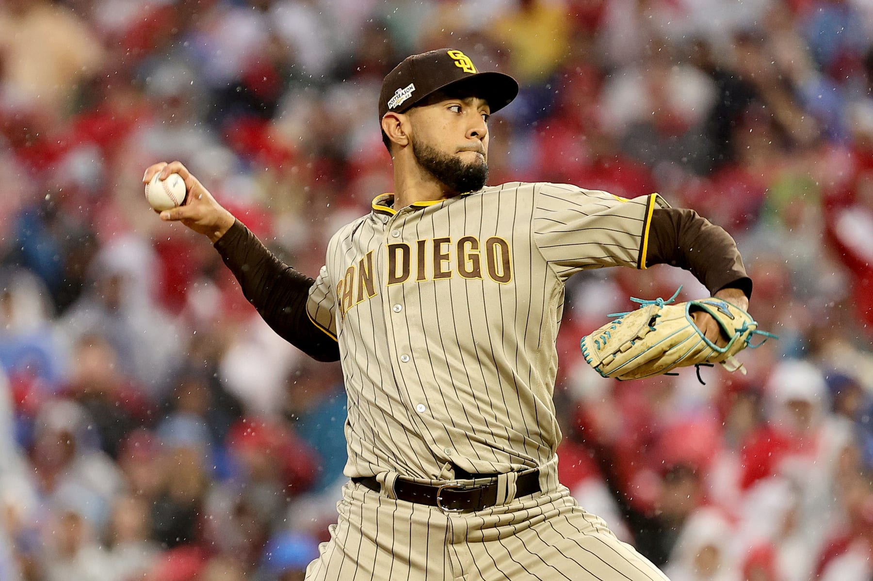 PHILADELPHIA, PENNSYLVANIA - OCTOBER 23: Robert Suarez #75 of the San Diego Padres throws a pitch during the seventh inning against the Philadelphia Phillies in game five of the National League Championship Series at Citizens Bank Park on October 23, 2022 in Philadelphia, Pennsylvania. (Photo by Tim Nwachukwu/Getty Images)