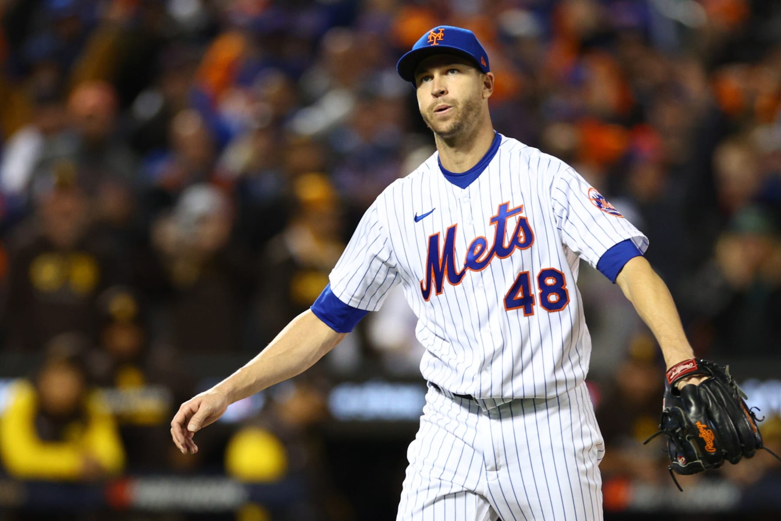 NEW YORK, NEW YORK - OCTOBER 08: Jacob deGrom #48 of the New York Mets reacts to striking out Manny Machado #13 of the San Diego Padres to get out of the third inning in game two of the Wild Card Series at Citi Field on October 08, 2022 in New York City. (Photo by Elsa/Getty Images) NEW YORK, NEW YORK - OCTOBER 08: Jacob deGrom #48 of the New York Mets reacts to striking out Manny Machado #13 of the San Diego Padres to get out of the third inning in game two of the Wild Card Series at Citi Field on October 08, 2022 in New York City. (Photo by Elsa/Getty Images)