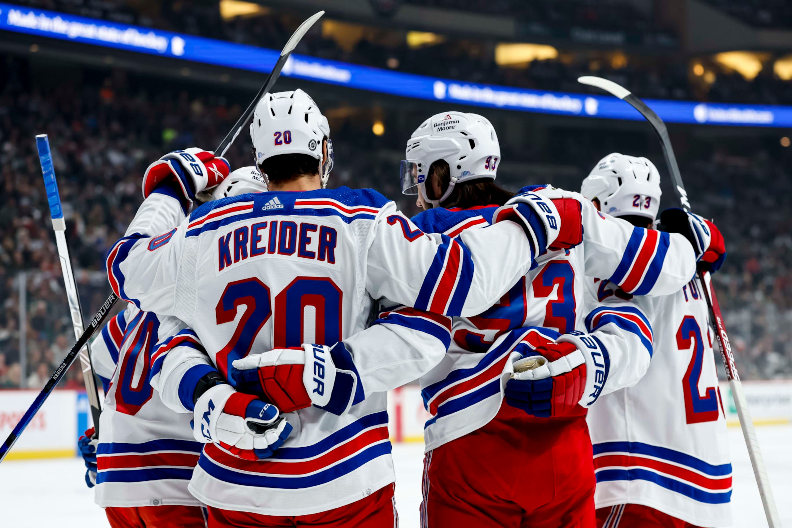 ST PAUL, MN - OCTOBER 13: Chris Kreider #20 of the New York Rangers celebrates his power play goal against the Minnesota Wild with teammates in the first period of the game at Xcel Energy Center on October 13, 2022 in St Paul, Minnesota. The Rangers defeated the Wild 7-3. (Photo by David Berding/Getty Images)