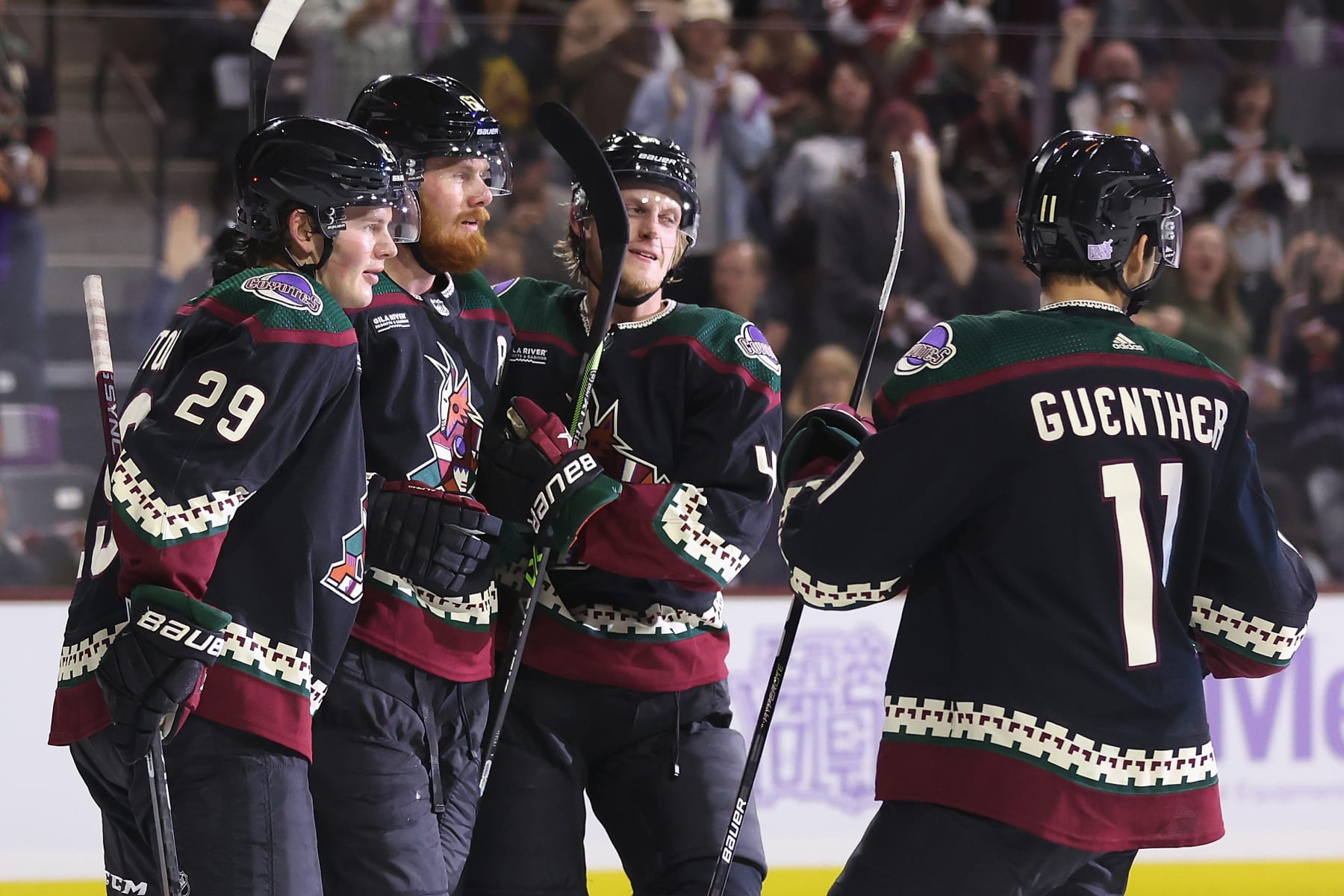 TEMPE, ARIZONA - NOVEMBER 01: (L-R) Barrett Hayton #29, Lawson Crouse #67, Juuso Valimaki #4 and Dylan Guenther #11 of the Arizona Coyotes celebrate after Crouse scored a power-play goal against the Florida Panthersduring the second period of the NHL game at Mullett Arena on November 01, 2022 in Tempe, Arizona. (Photo by Christian Petersen/Getty Images)