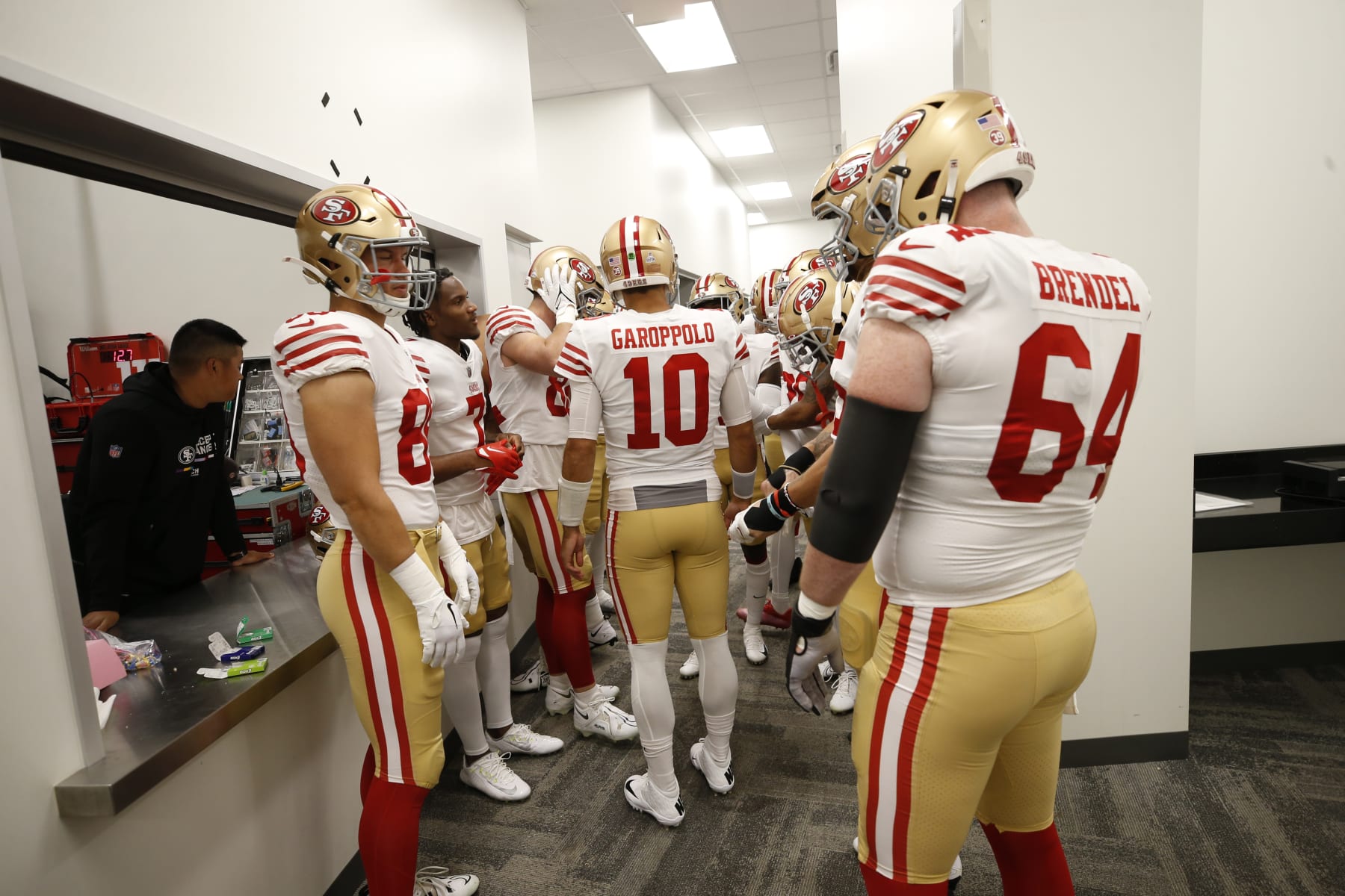 INGLEWOOD, CA - OCTOBER 30: Jimmy Garoppolo #10 of the San Francisco 49ers talks to teammates in the locker room before the game against the Los Angeles Rams at SoFi Stadium on October 30, 2022 in Inglewood, California. The 49ers defeated the Rams 31-14. (Photo by Michael Zagaris/San Francisco 49ers/Getty Images)