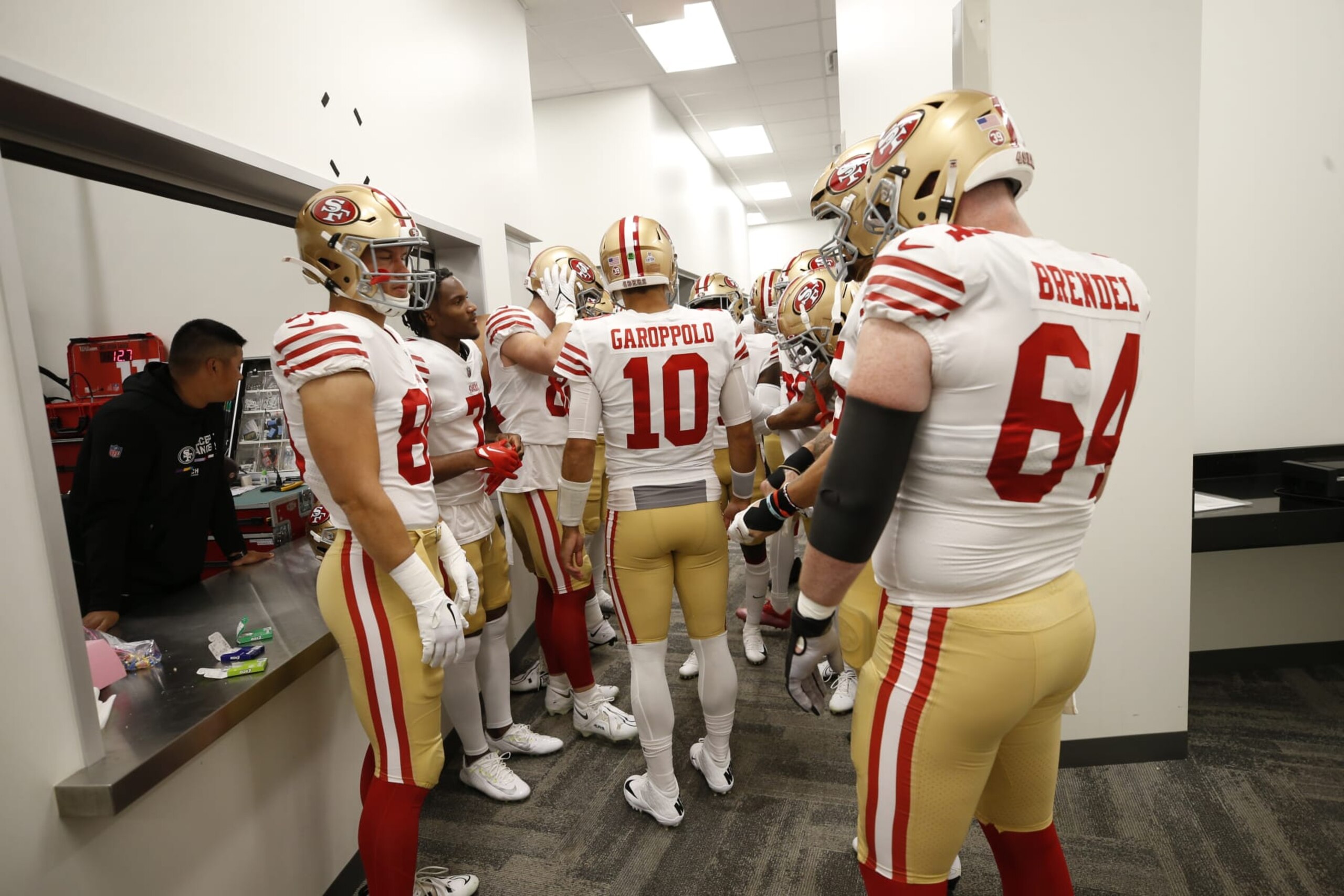 INGLEWOOD, CA - OCTOBER 30: Jimmy Garoppolo #10 of the San Francisco 49ers talks to teammates in the locker room before the game against the Los Angeles Rams at SoFi Stadium on October 30, 2022 in Inglewood, California. The 49ers defeated the Rams 31-14. (Photo by Michael Zagaris/San Francisco 49ers/Getty Images)