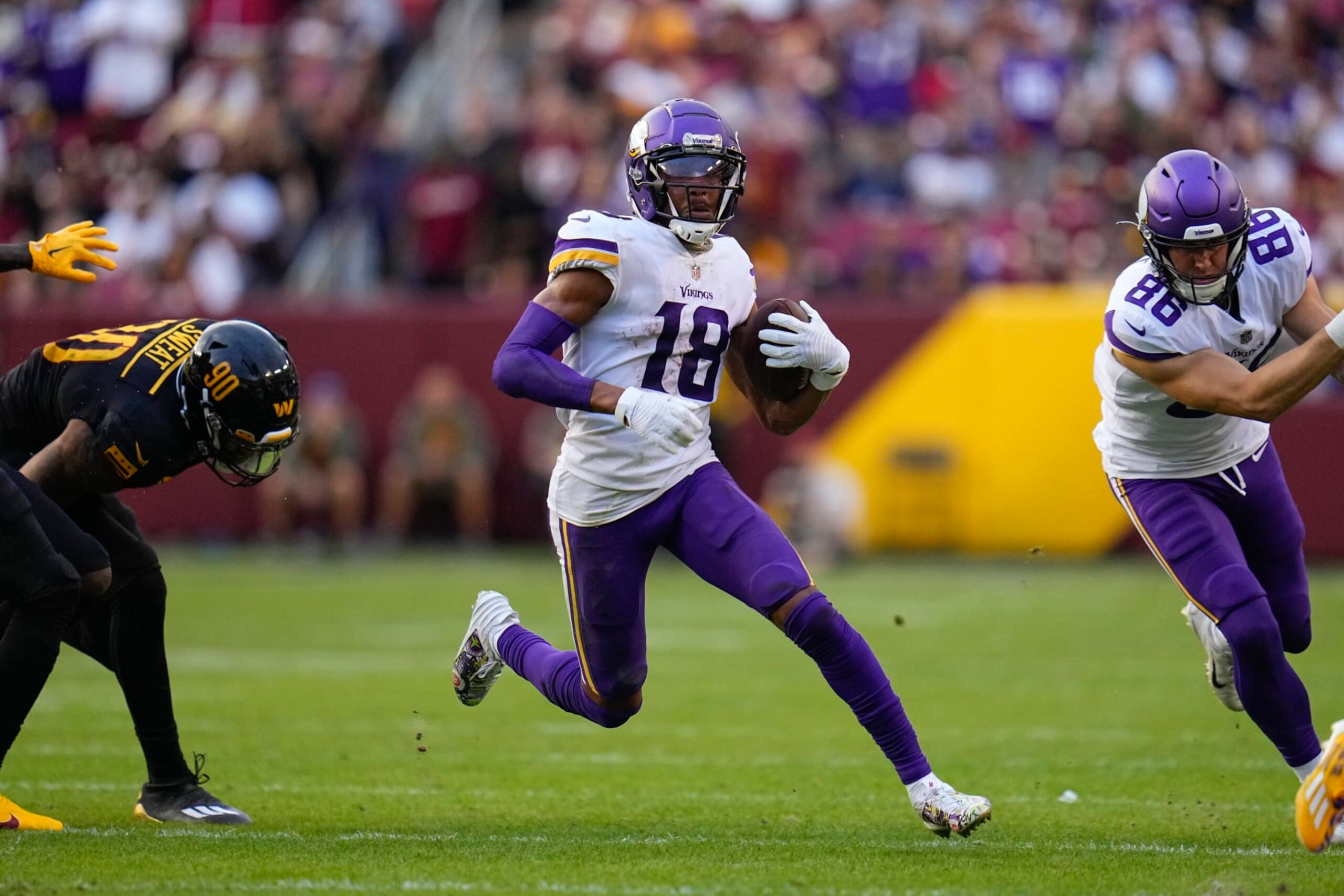 Minnesota Vikings wide receiver Justin Jefferson (18) running with the ball during the second half of an NFL football game against the Washington Commanders, Sunday, Nov. 6, 2022, in Landover, Md. (AP Photo/Julio Cortez) Minnesota Vikings wide receiver Justin Jefferson (18) running with the ball during the second half of an NFL football game against the Washington Commanders, Sunday, Nov. 6, 2022, in Landover, Md. (AP Photo/Julio Cortez)