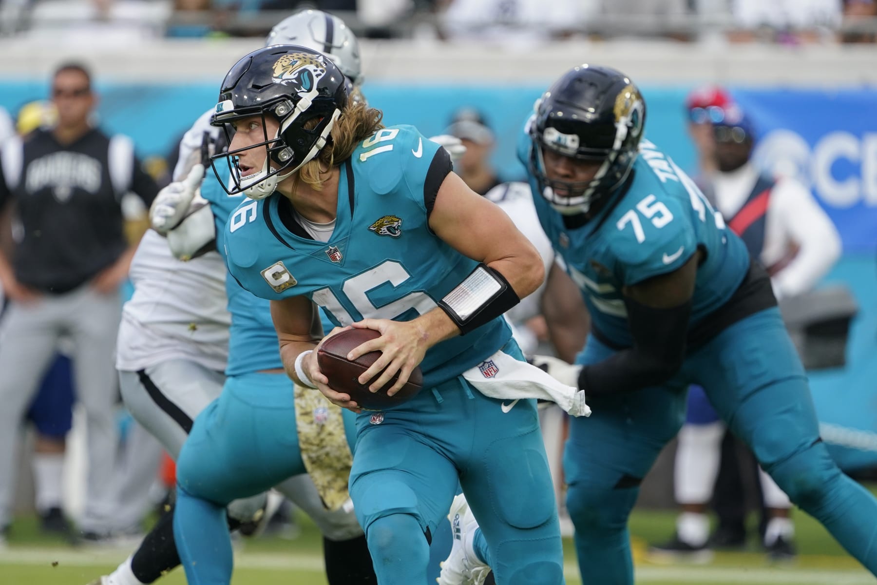 Jacksonville Jaguars quarterback Trevor Lawrence (16) plays against the Las Vegas Raiders in the second half of an NFL football game Sunday, Nov. 6, 2022, in Jacksonville, Fla. (AP Photo/John Raoux)