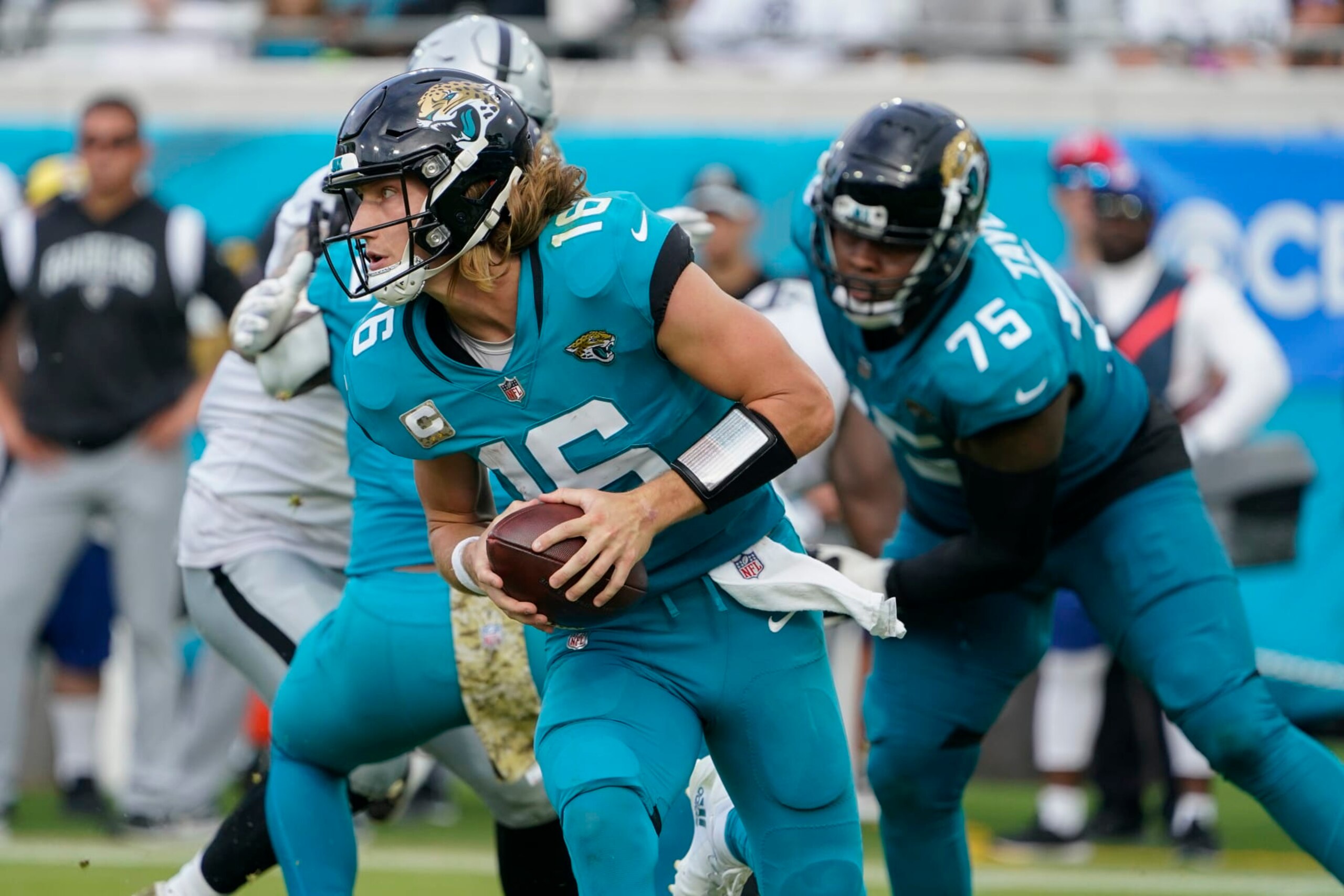 Jacksonville Jaguars quarterback Trevor Lawrence (16) plays against the Las Vegas Raiders in the second half of an NFL football game Sunday, Nov. 6, 2022, in Jacksonville, Fla. (AP Photo/John Raoux) Jacksonville Jaguars quarterback Trevor Lawrence (16) plays against the Las Vegas Raiders in the second half of an NFL football game Sunday, Nov. 6, 2022, in Jacksonville, Fla. (AP Photo/John Raoux)