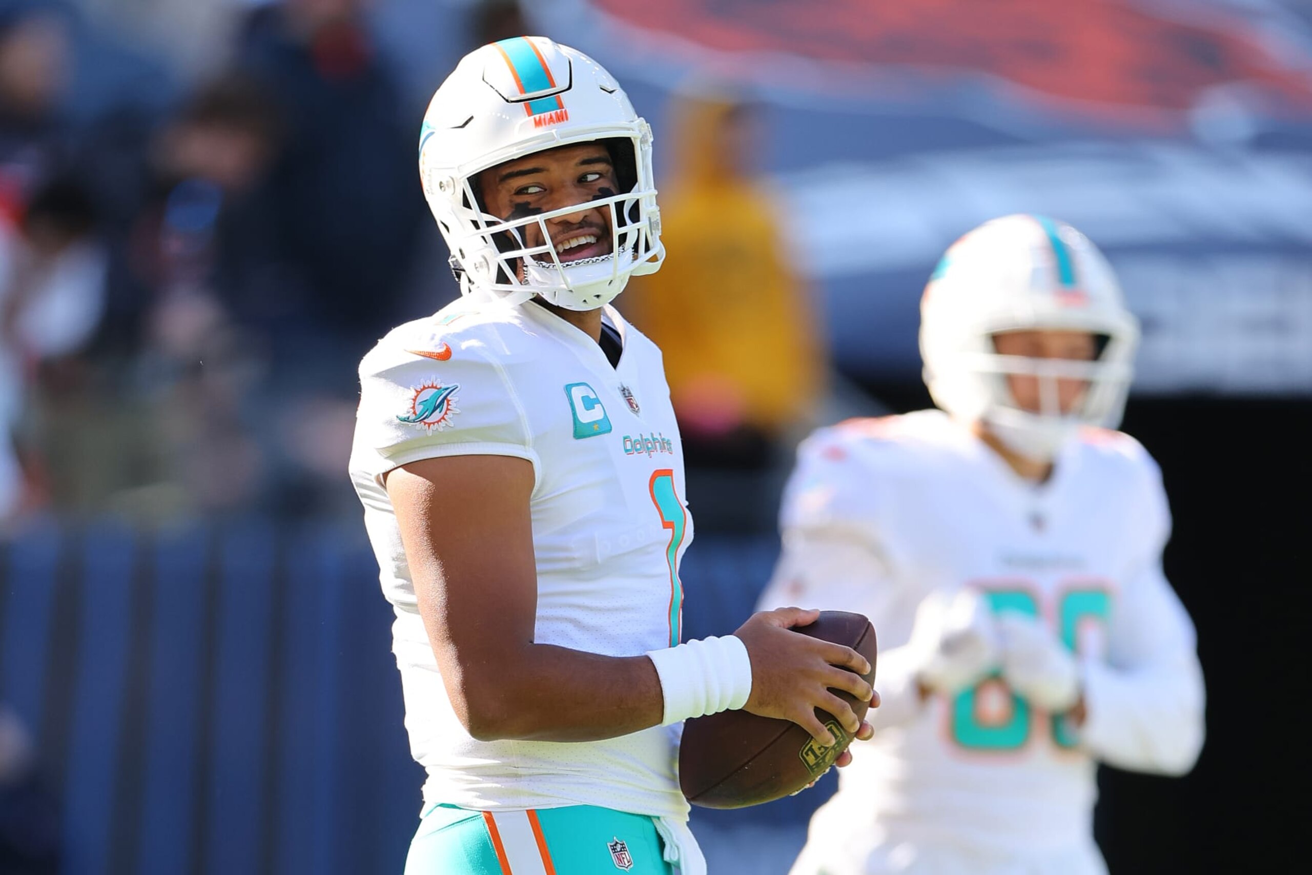 CHICAGO, ILLINOIS - NOVEMBER 06: Tua Tagovailoa #1 of the Miami Dolphins looks on prior to the game against the Chicago Bears at Soldier Field on November 06, 2022 in Chicago, Illinois. (Photo by Michael Reaves/Getty Images) CHICAGO, ILLINOIS - NOVEMBER 06: Tua Tagovailoa #1 of the Miami Dolphins looks on prior to the game against the Chicago Bears at Soldier Field on November 06, 2022 in Chicago, Illinois. (Photo by Michael Reaves/Getty Images)