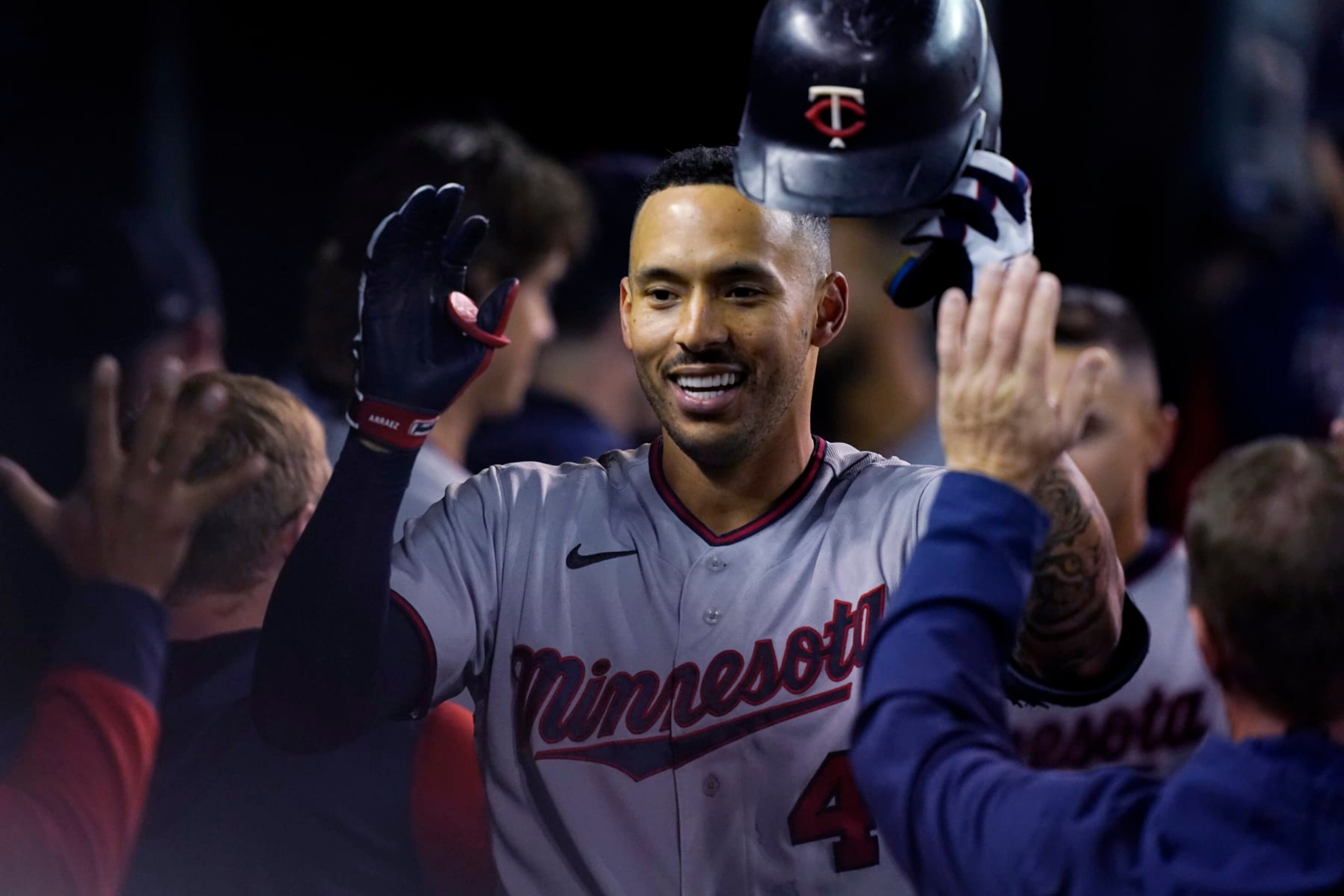 Minnesota Twins' Carlos Correa is greeted in the dugout after his two-run home run during the seventh inning of a baseball game against the Detroit Tigers, Friday, Sept. 30, 2022, in Detroit. (AP Photo/Carlos Osorio) Minnesota Twins' Carlos Correa is greeted in the dugout after his two-run home run during the seventh inning of a baseball game against the Detroit Tigers, Friday, Sept. 30, 2022, in Detroit. (AP Photo/Carlos Osorio)