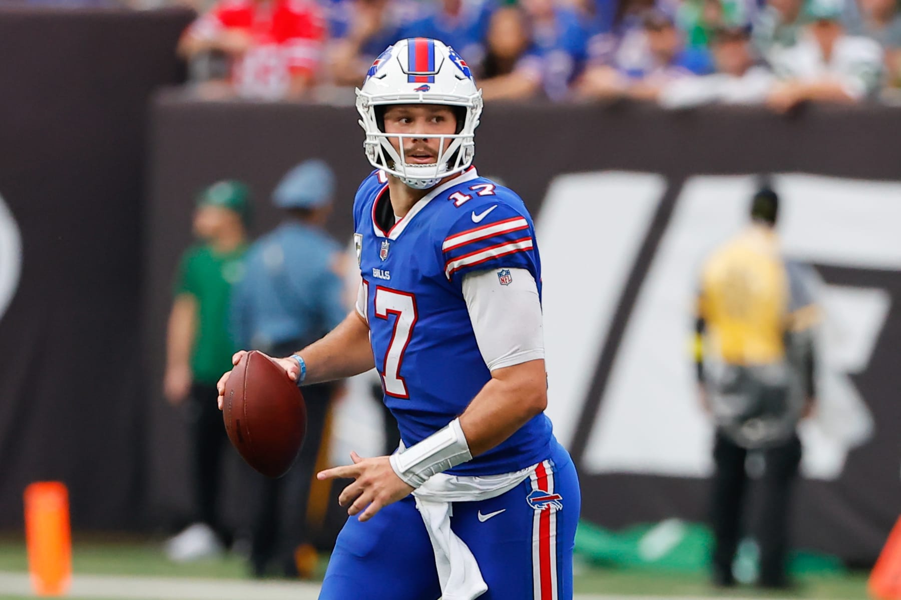 EAST RUTHERFORD, NJ - NOVEMBER 06:  Buffalo Bills quarterback Josh Allen (17) rolls out during the National Football League game between the New York Jets and Buffalo Bills on November 6, 2022 at MetLife Stadium in East Rutherford, New Jersey.  (Photo by Rich Graessle/Icon Sportswire via Getty Images)