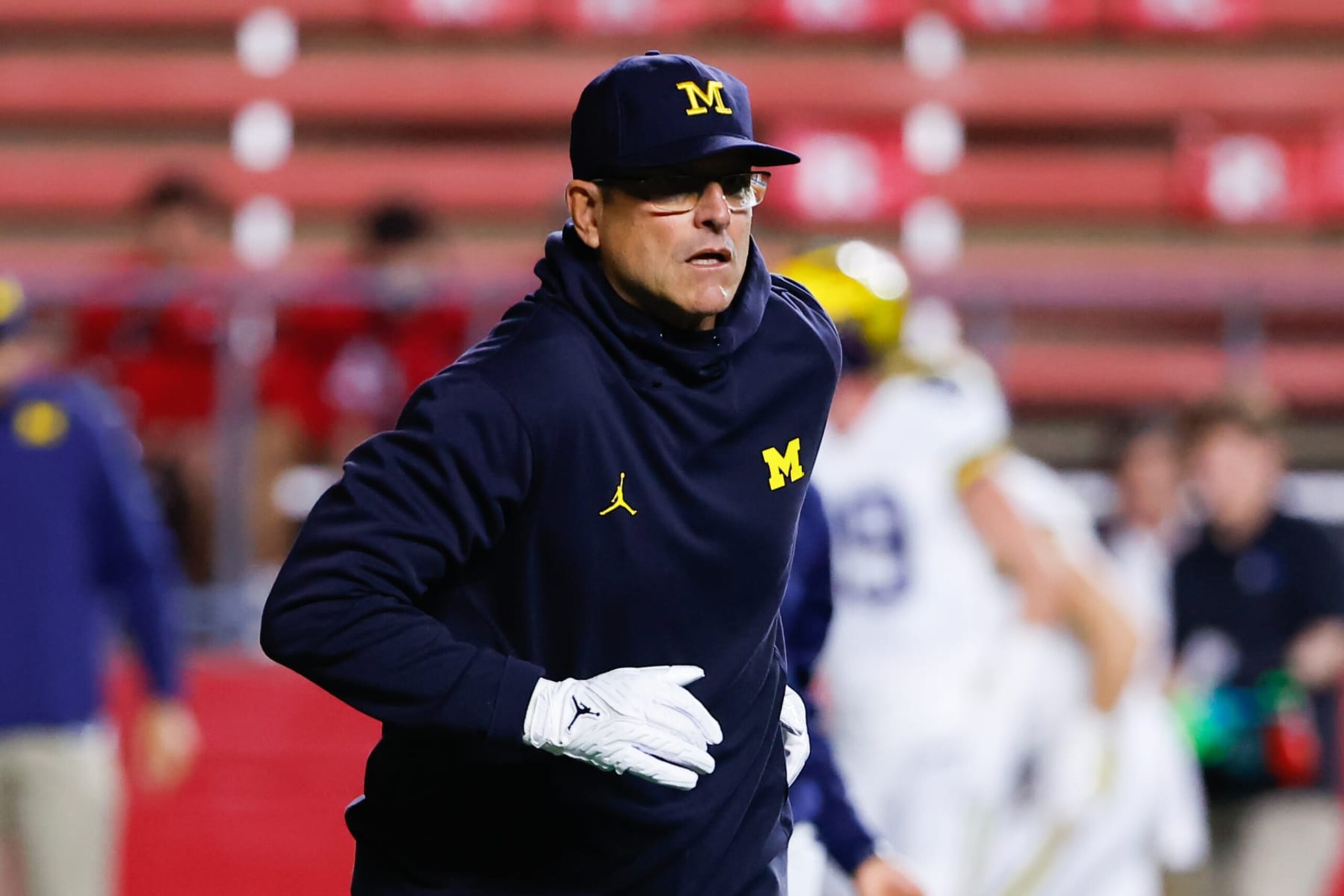 PISCATAWAY, NJ - NOVEMBER 05: Michigan Wolverines head coach Jim Harbaugh prior to the college football game against the Rutgers Scarlet Knights on November 5, 2022 at SHI Stadium in Piscataway, New Jersey. (Photo by Rich Graessle/Icon Sportswire via Getty Images) PISCATAWAY, NJ - NOVEMBER 05: Michigan Wolverines head coach Jim Harbaugh prior to the college football game against the Rutgers Scarlet Knights on November 5, 2022 at SHI Stadium in Piscataway, New Jersey. (Photo by Rich Graessle/Icon Sportswire via Getty Images)