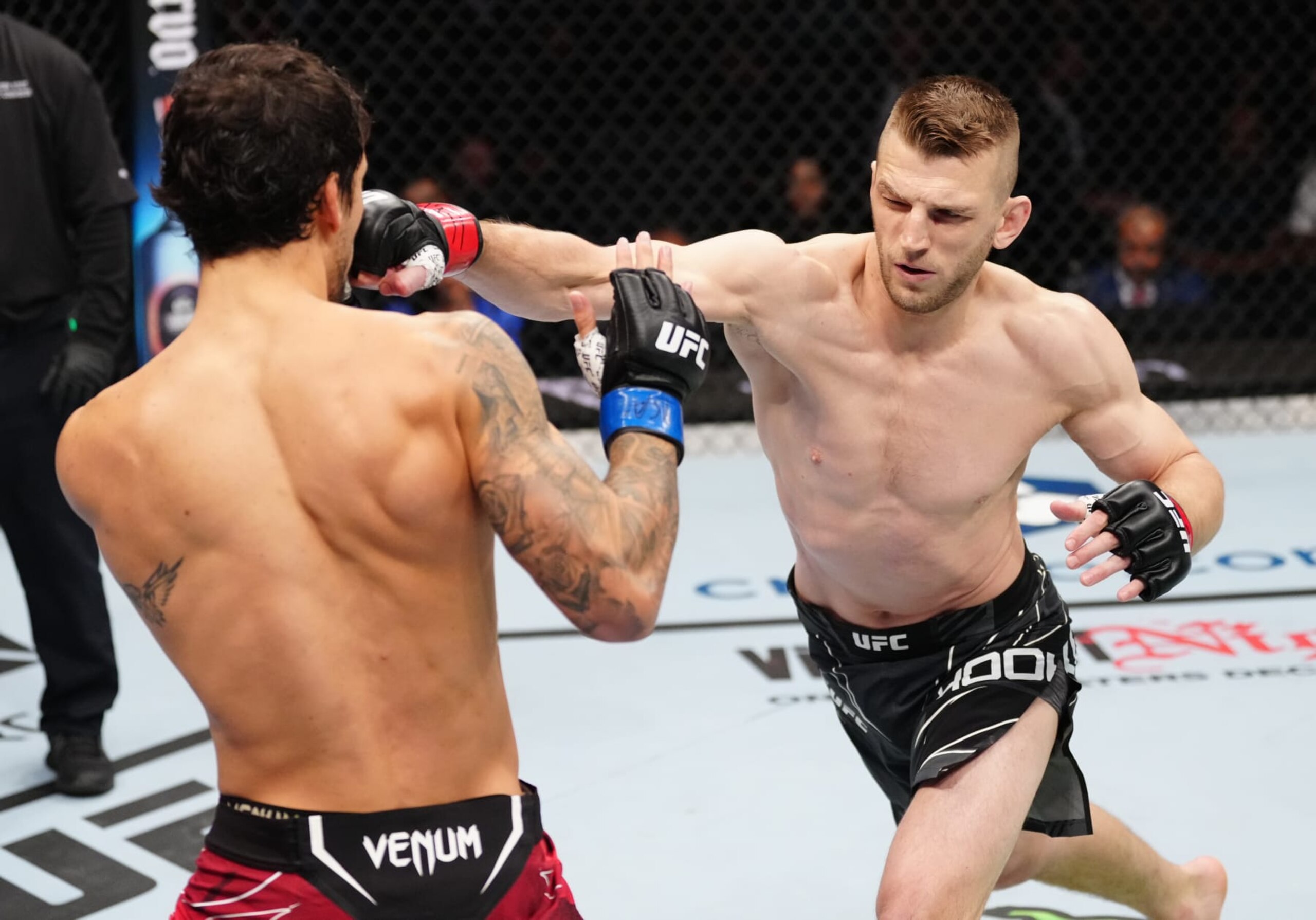 NEW YORK, NEW YORK - NOVEMBER 12: (R-L) Dan Hooker of New Zealand punches Claudio Puelles of Peru in a lightweight bout during the UFC 281 event at Madison Square Garden on November 12, 2022 in New York City. (Photo by Jeff Bottari/Zuffa LLC) NEW YORK, NEW YORK - NOVEMBER 12: (R-L) Dan Hooker of New Zealand punches Claudio Puelles of Peru in a lightweight bout during the UFC 281 event at Madison Square Garden on November 12, 2022 in New York City. (Photo by Jeff Bottari/Zuffa LLC)