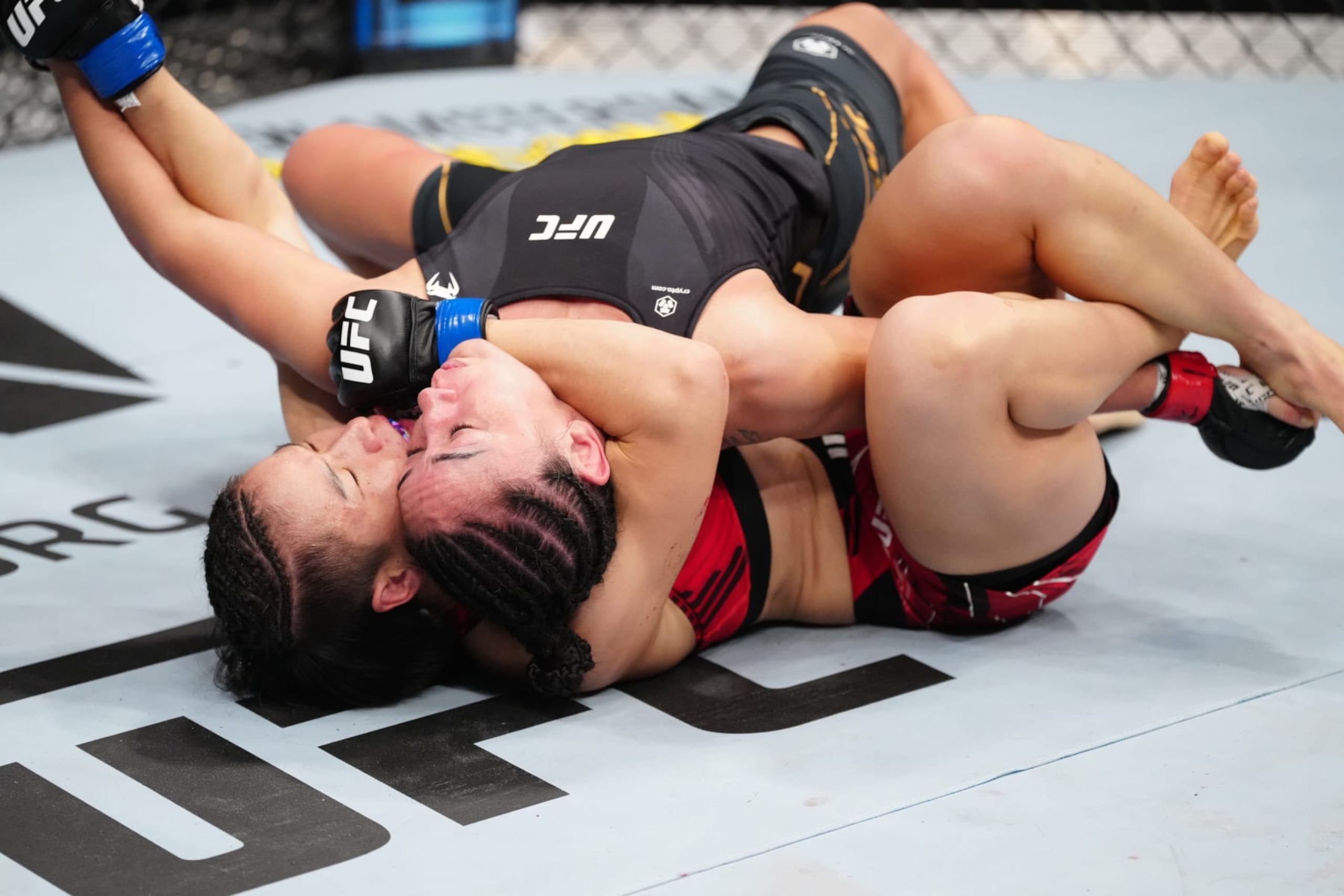 NEW YORK, NEW YORK - NOVEMBER 12: Zhang Weili of China secures a rear choke submission against Carla Esparza in the UFC strawweight championship bout during the UFC 281 event at Madison Square Garden on November 12, 2022 in New York City. (Photo by Jeff Bottari/Zuffa LLC) NEW YORK, NEW YORK - NOVEMBER 12: Zhang Weili of China secures a rear choke submission against Carla Esparza in the UFC strawweight championship bout during the UFC 281 event at Madison Square Garden on November 12, 2022 in New York City. (Photo by Jeff Bottari/Zuffa LLC)