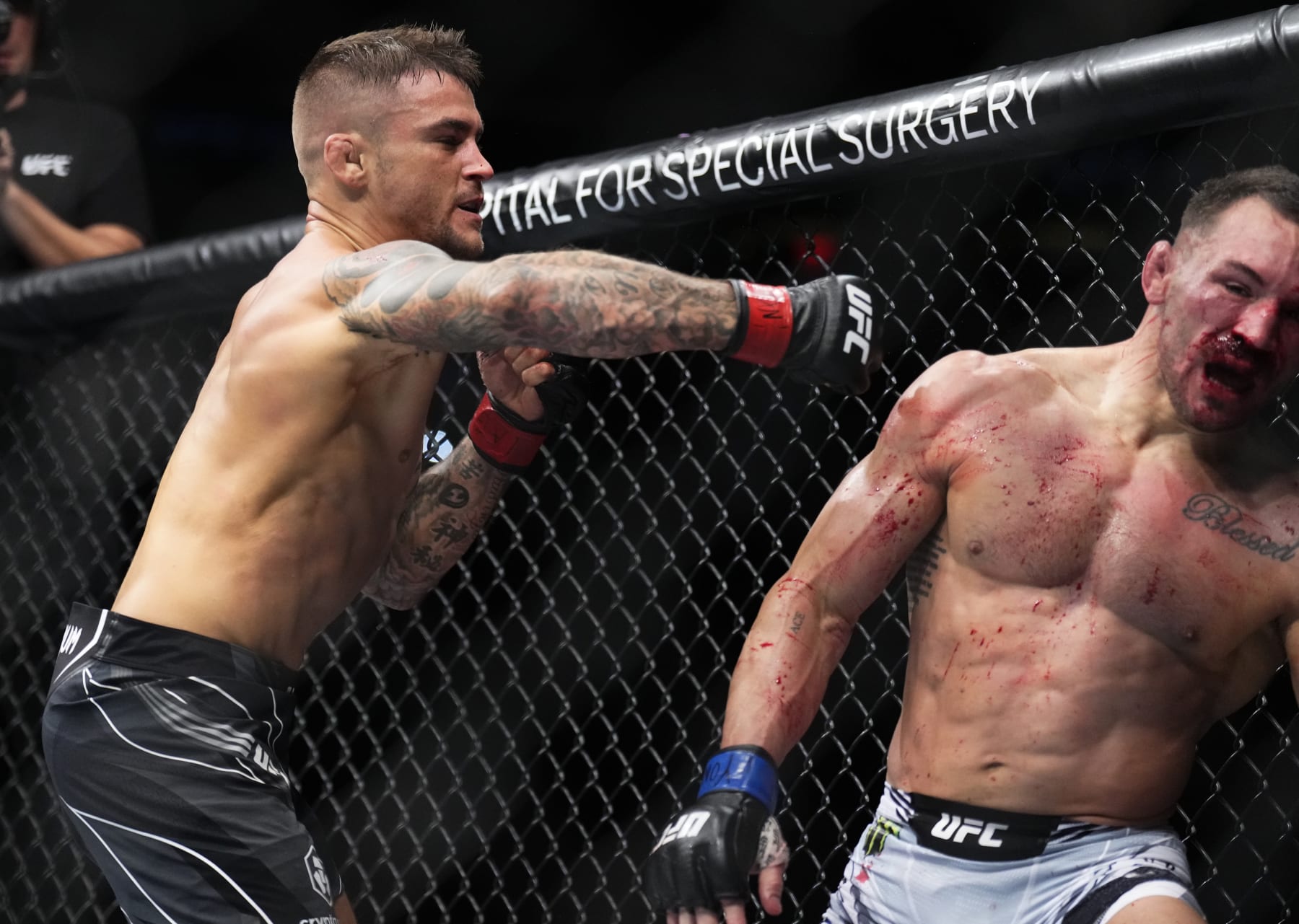 NEW YORK, NEW YORK - NOVEMBER 12: (L-R) Dustin Poirier punches Michael Chandler in a lightweight bout during the UFC 281 event at Madison Square Garden on November 12, 2022 in New York City. (Photo by Chris Unger/Zuffa LLC)