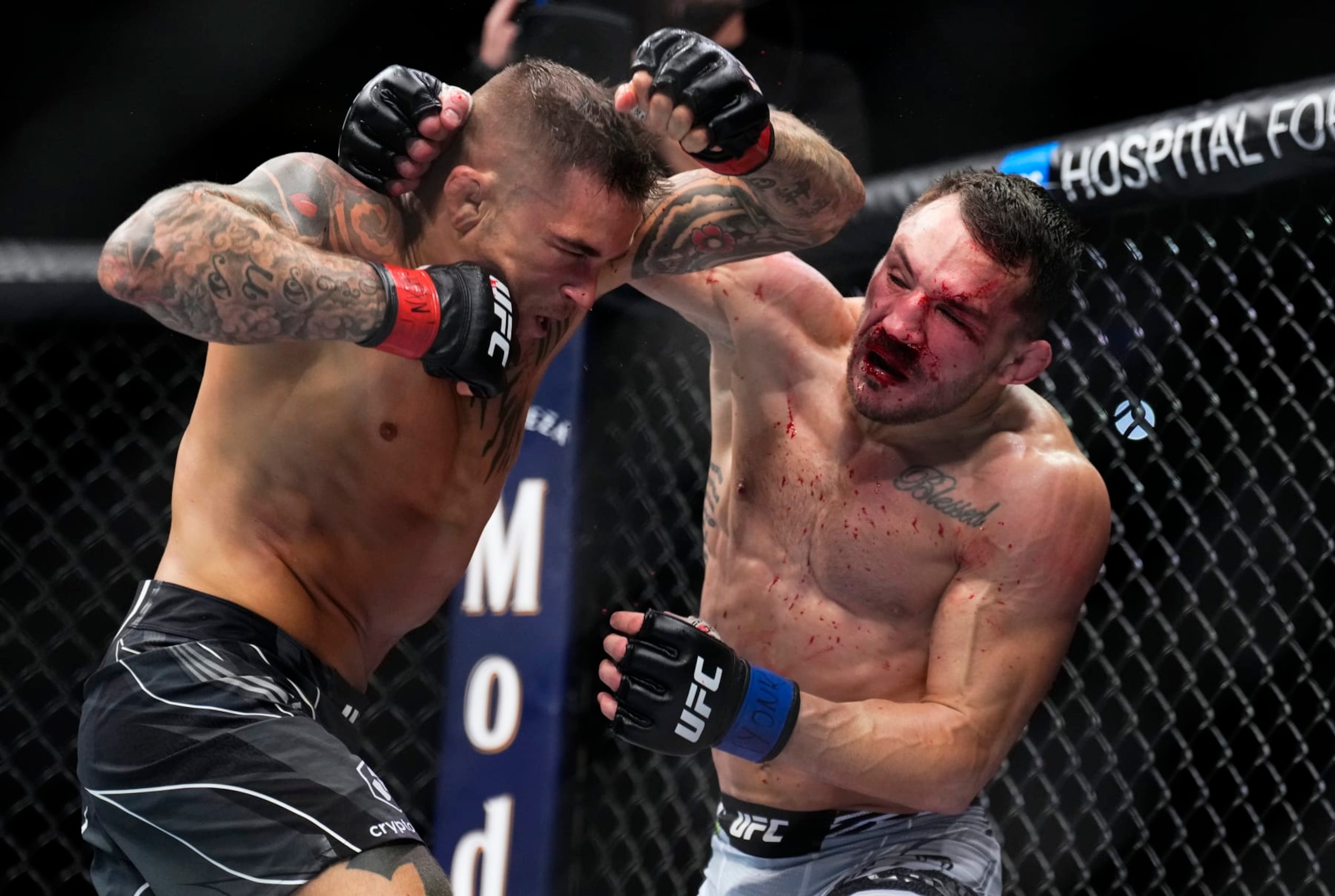 NEW YORK, NEW YORK - NOVEMBER 12: (R-L) Michael Chandler punches Dustin Poirier in a lightweight bout during the UFC 281 event at Madison Square Garden on November 12, 2022 in New York City. (Photo by Chris Unger/Zuffa LLC)