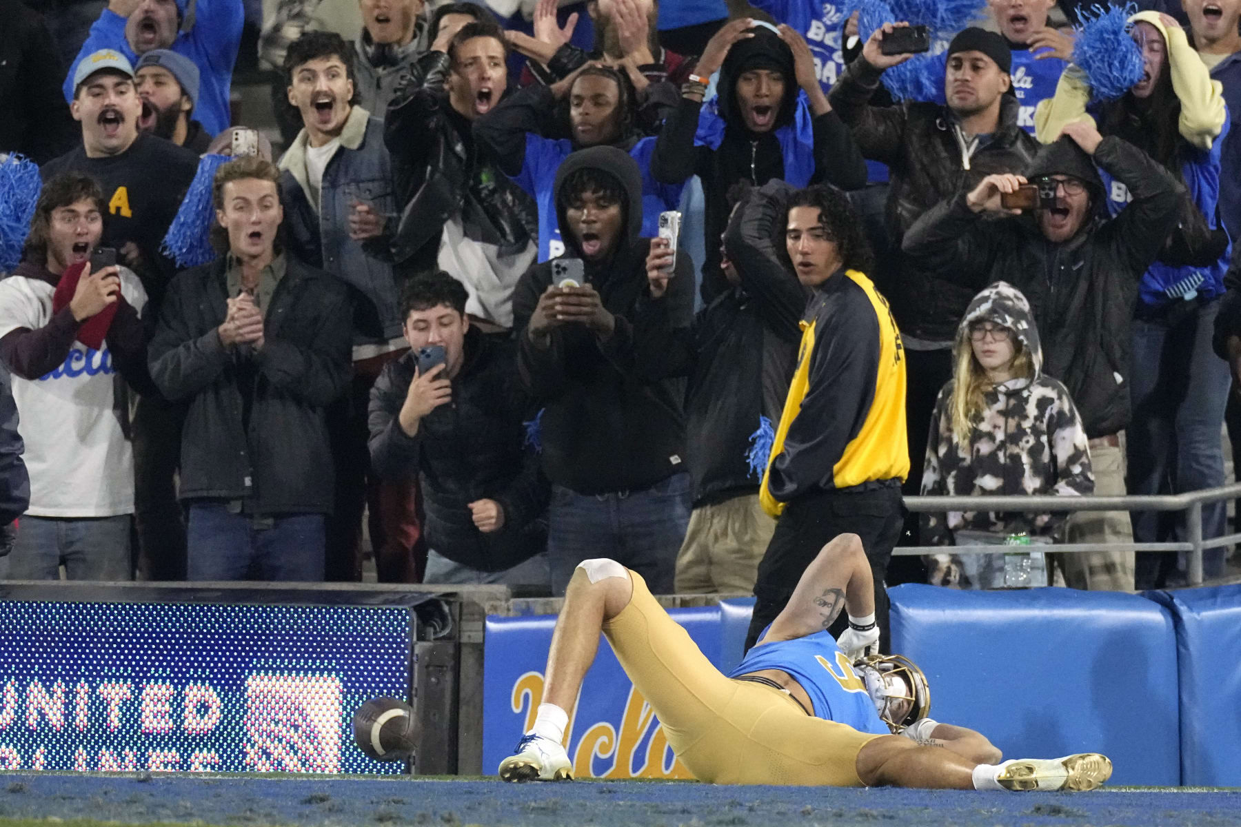 UCLA wide receiver Jake Bobo reacts after being unable to hold on to a ball thrown to the end zone with no time left in an NCAA college football game against Arizona Saturday, Nov. 12, 2022, in Pasadena, Calif. Arizona won 34-28. (AP Photo/Mark J. Terrill)