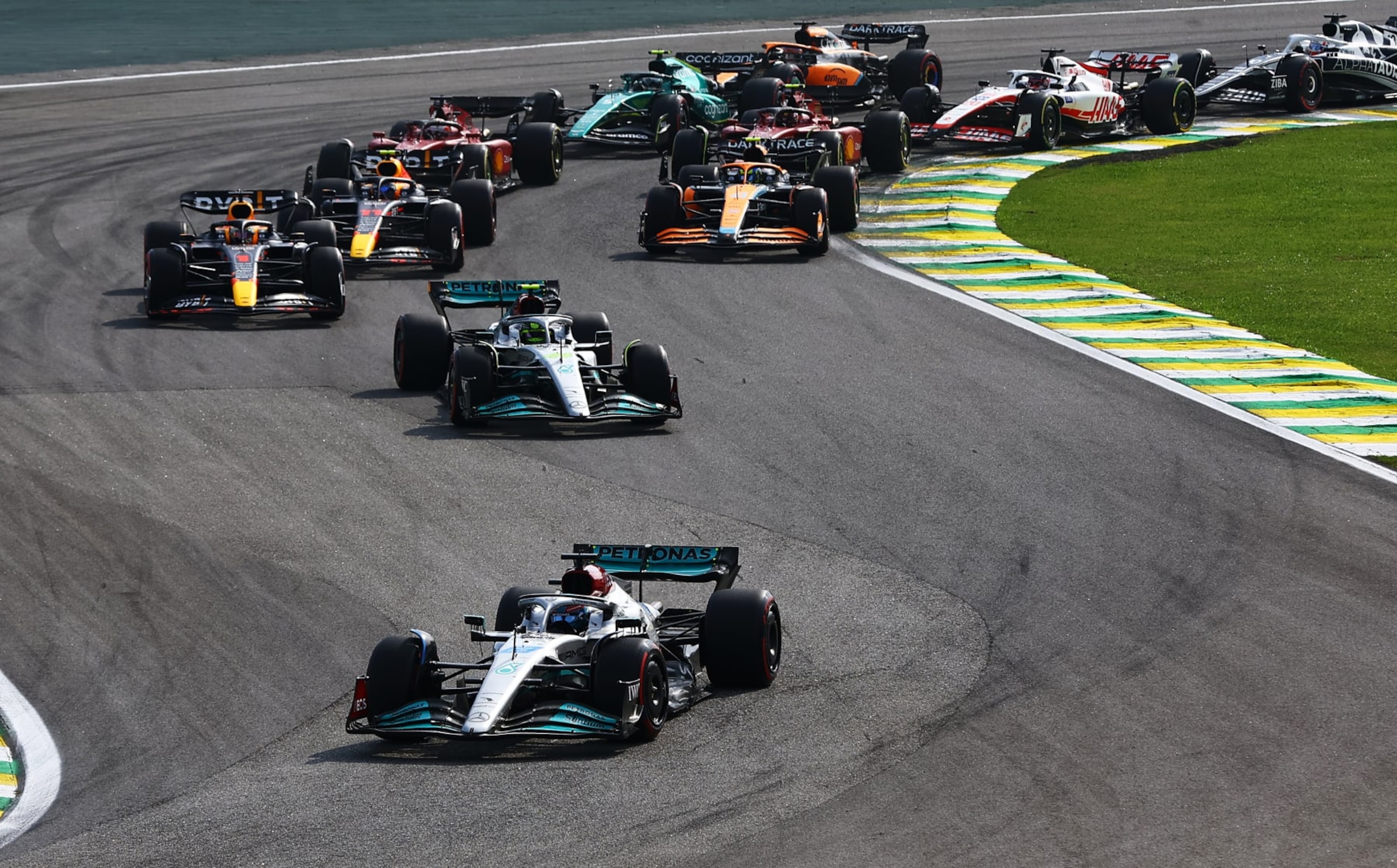 SAO PAULO, BRAZIL - NOVEMBER 13: George Russell of Great Britain driving the (63) Mercedes AMG Petronas F1 Team W13 leads the field at the start during the F1 Grand Prix of Brazil at Autodromo Jose Carlos Pace on November 13, 2022 in Sao Paulo, Brazil. (Photo by Mark Thompson/Getty Images)