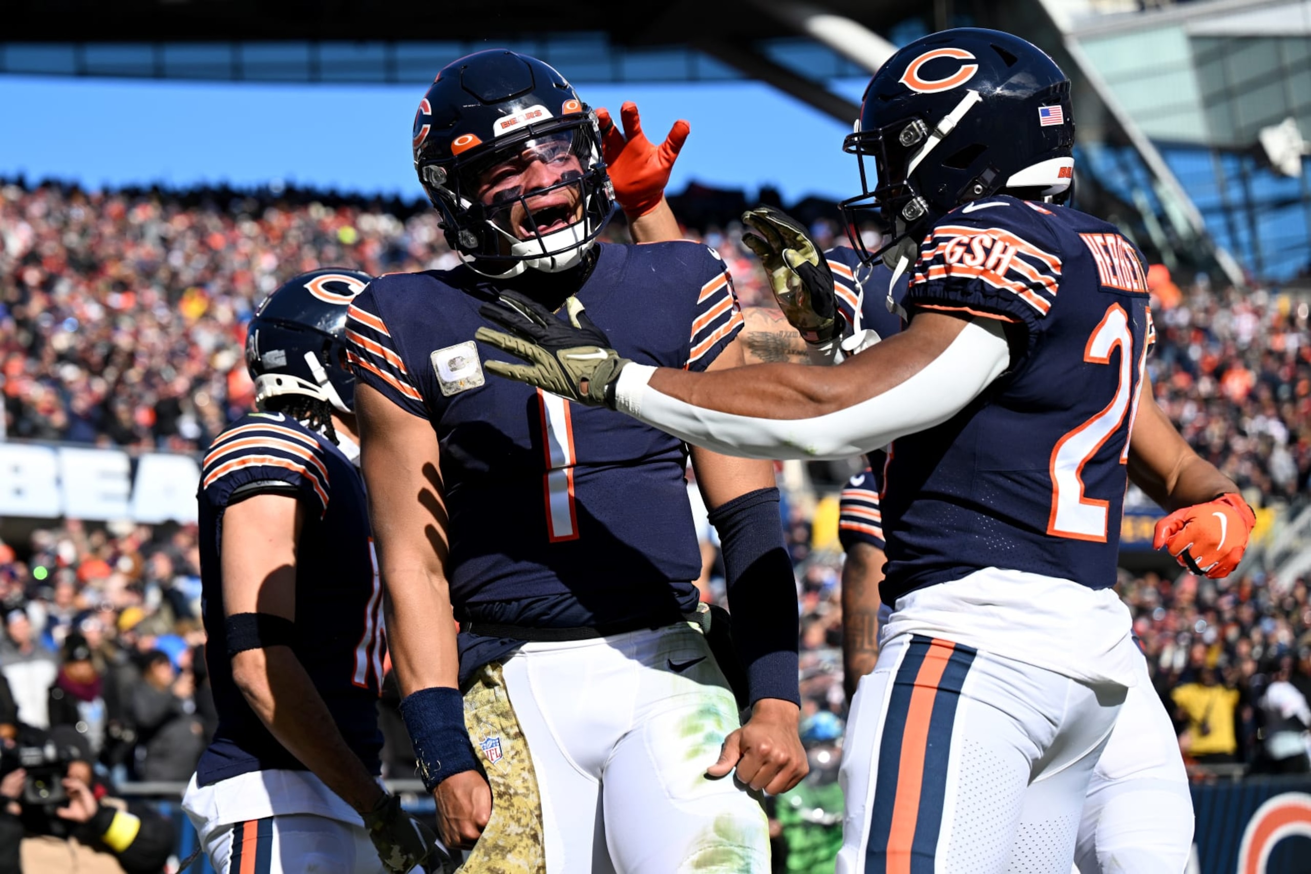 CHICAGO, ILLINOIS - NOVEMBER 13: Justin Fields #1 of the Chicago Bears celebrates with Khalil Herbert #24 of the Chicago Bears after scoring a touchdown during the second quarter against the Detroit Lions at Soldier Field on November 13, 2022 in Chicago, Illinois. (Photo by Quinn Harris/Getty Images) CHICAGO, ILLINOIS - NOVEMBER 13: Justin Fields #1 of the Chicago Bears celebrates with Khalil Herbert #24 of the Chicago Bears after scoring a touchdown during the second quarter against the Detroit Lions at Soldier Field on November 13, 2022 in Chicago, Illinois. (Photo by Quinn Harris/Getty Images)