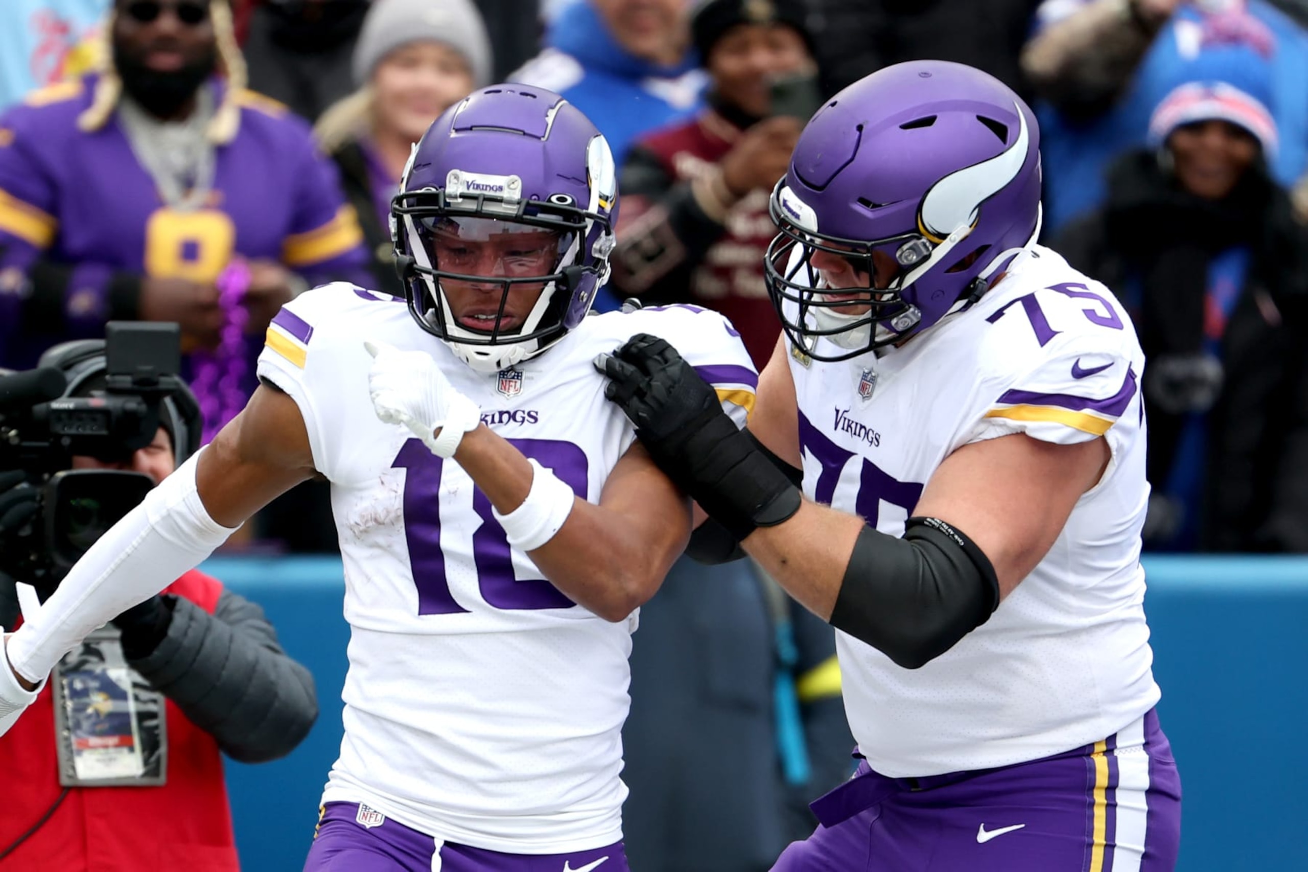 ORCHARD PARK, NEW YORK - NOVEMBER 13: Justin Jefferson #18 of the Minnesota Vikings celebrates with Brian O'Neill #75 of the Minnesota Vikings after Jefferson's touchdown during the first quarter against the Buffalo Bills at Highmark Stadium on November 13, 2022 in Orchard Park, New York. (Photo by Timothy T Ludwig/Getty Images)