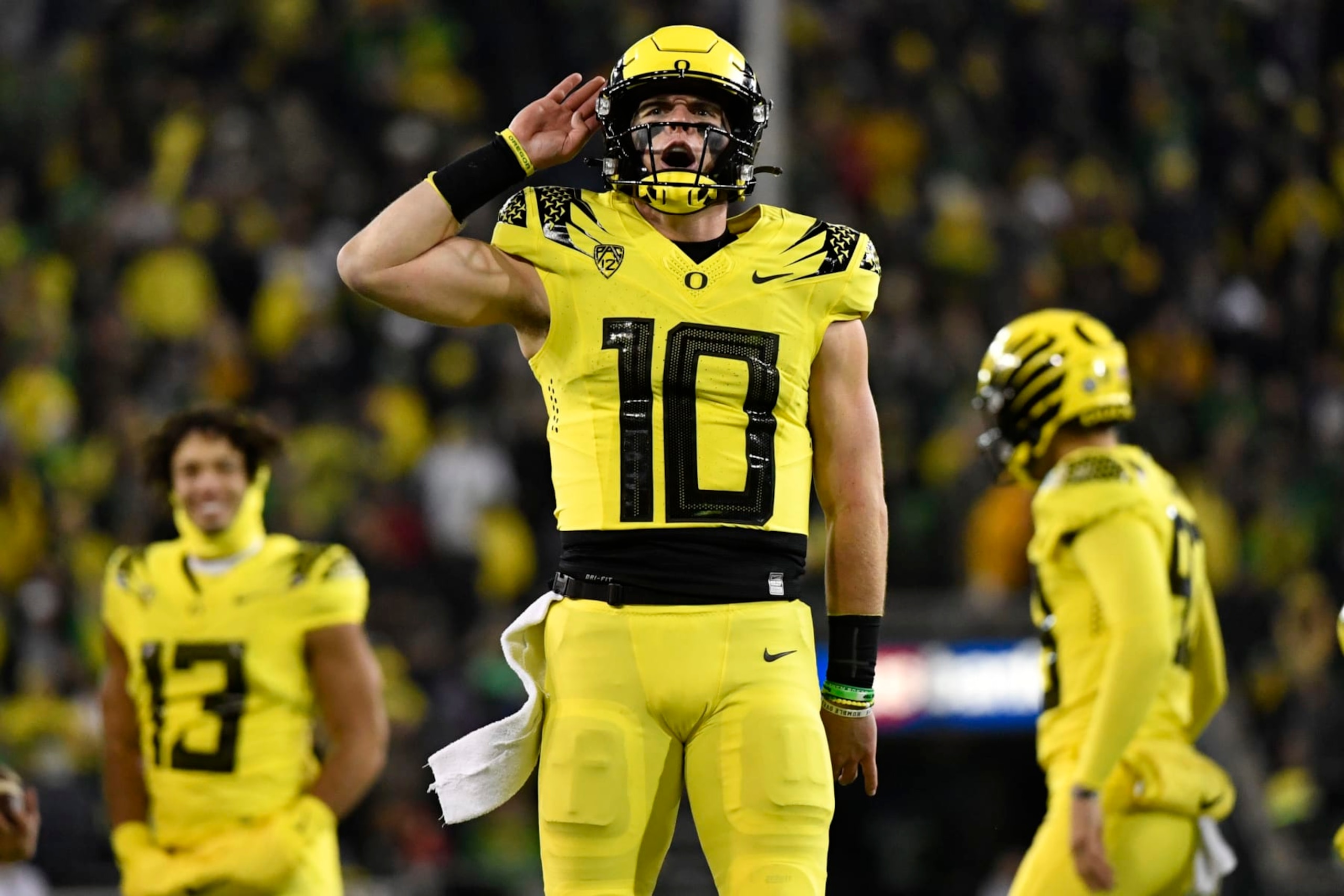 Oregon quarterback Bo Nix (10) celebrates a touchdown against Washington during the second half of an NCAA college football game Saturday, Nov. 12, 2022, in Eugene, Ore. (AP Photo/Andy Nelson)