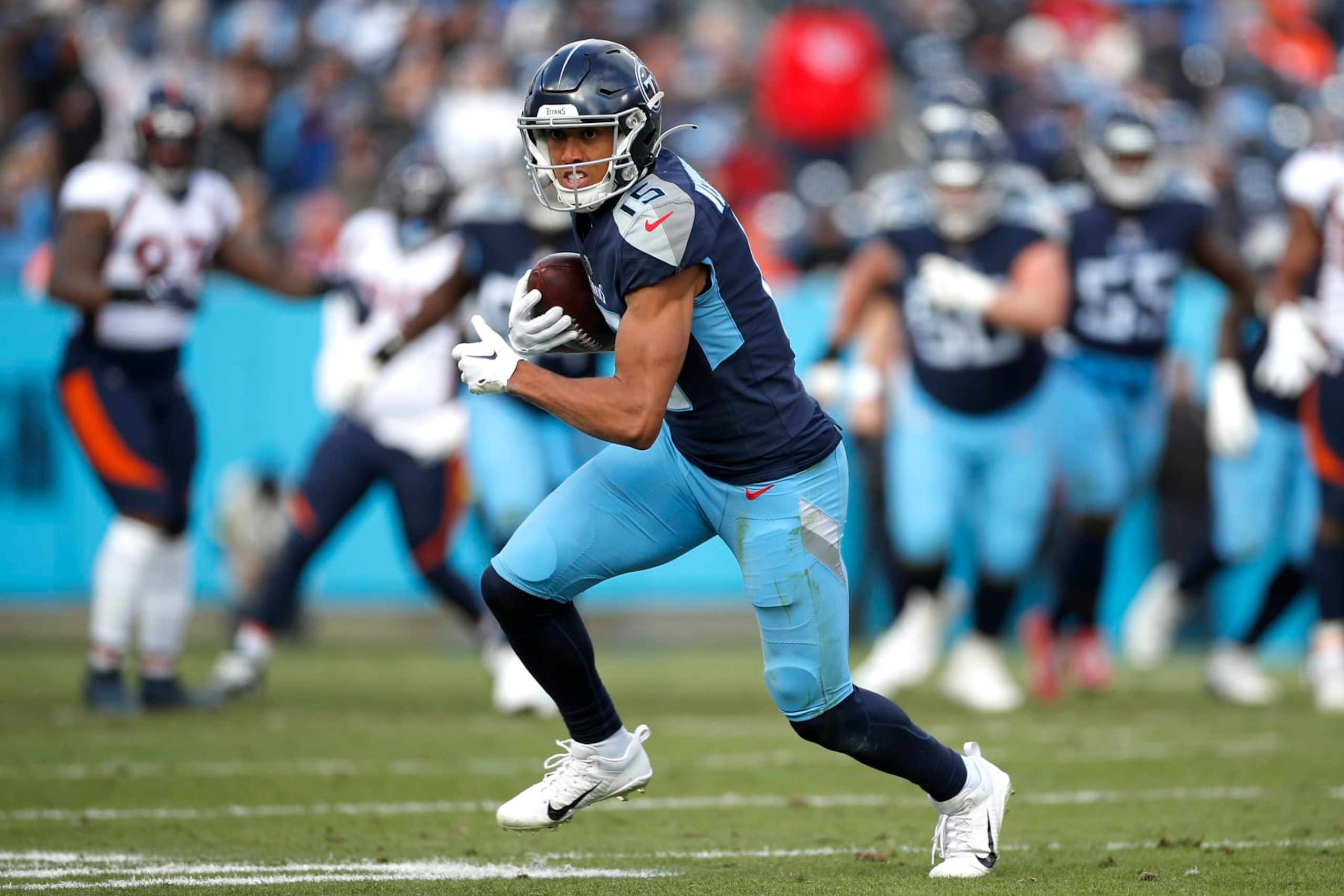 NASHVILLE, TENNESSEE - NOVEMBER 13: Nick Westbrook-Ikhine #15 of the Tennessee Titans runs upfield after making a catch during the second quarter against the Denver Broncos at Nissan Stadium on November 13, 2022 in Nashville, Tennessee. (Photo by Silas Walker/Getty Images) NASHVILLE, TENNESSEE - NOVEMBER 13: Nick Westbrook-Ikhine #15 of the Tennessee Titans runs upfield after making a catch during the second quarter against the Denver Broncos at Nissan Stadium on November 13, 2022 in Nashville, Tennessee. (Photo by Silas Walker/Getty Images)