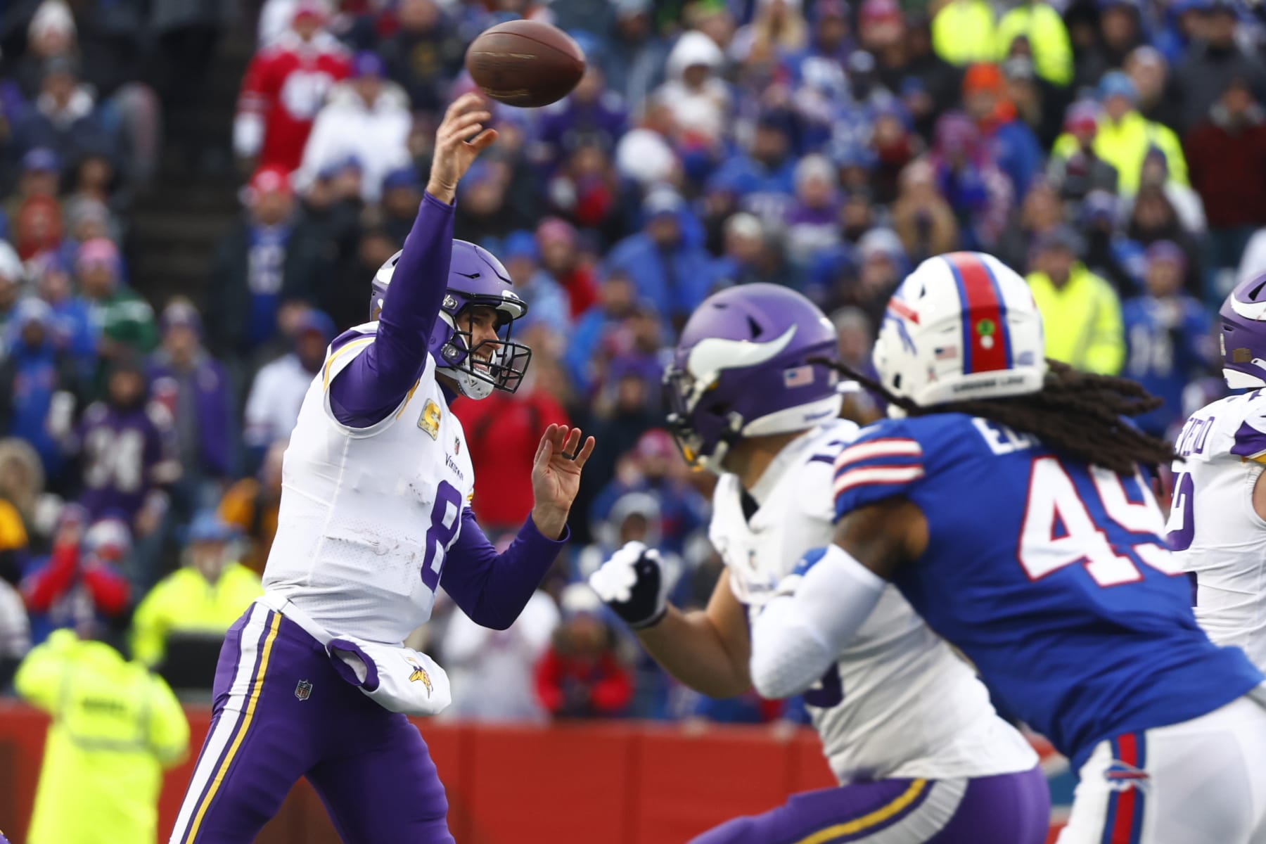 Minnesota Vikings quarterback Kirk Cousins passes under pressure form Buffalo Bills linebacker Tremaine Edmunds in the first half of an NFL football game, Sunday, Nov. 13, 2022, in Orchard Park, N.Y. (AP Photo/Jeffrey T. Barnes)