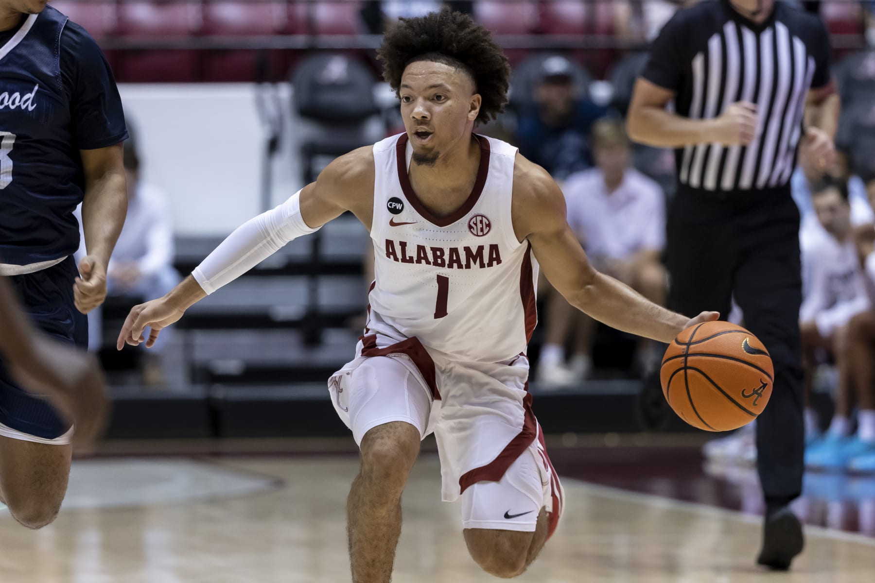 Alabama guard Mark Sears (1) works the ball down the court against Longwood during the second half of an NCAA college basketball game, Monday, Nov. 7, 2022, in Tuscaloosa, Ala. (AP Photo/Vasha Hunt)