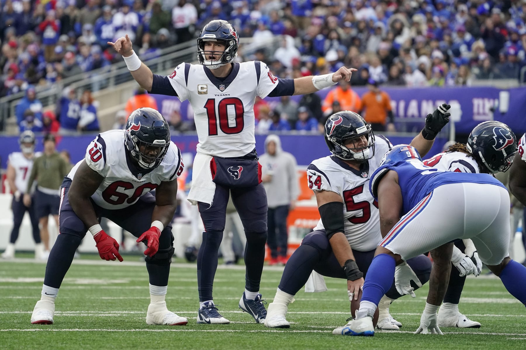Houston Texans quarterback Davis Mills (10) calls an audible at the line of scrimmage against the New York Giants during the fourth quarter of an NFL football game, Sunday, Nov. 13, 2022, in East Rutherford, N.J. (AP Photo/John Minchillo)