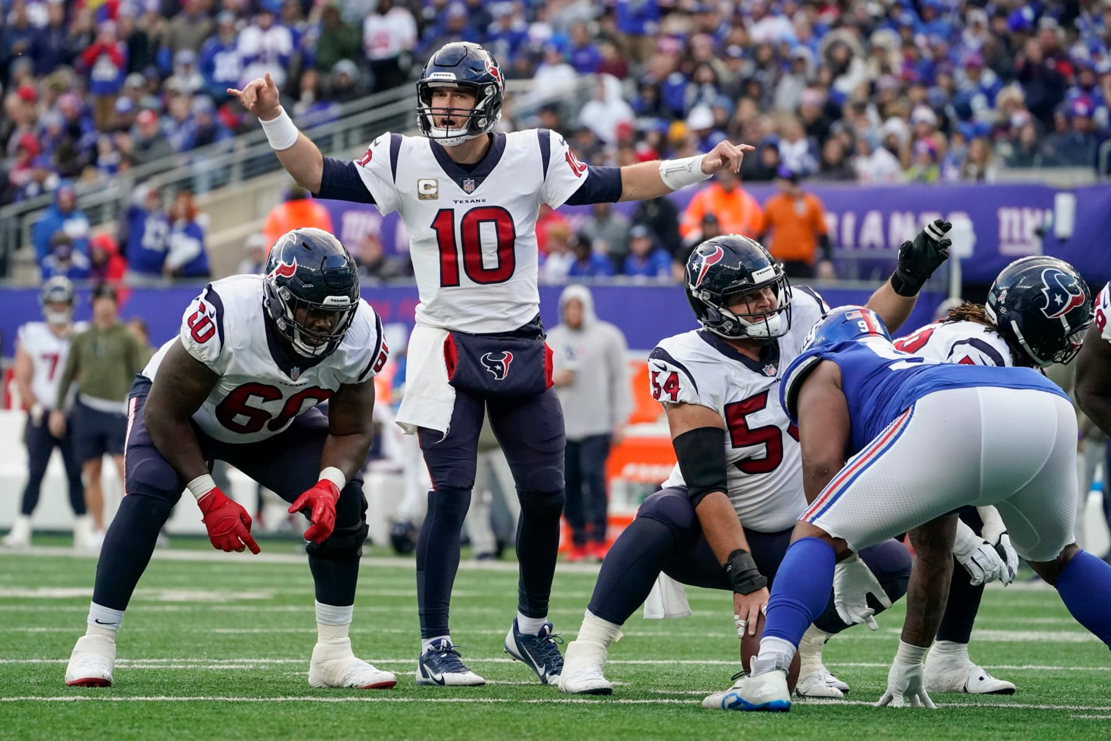 Houston Texans quarterback Davis Mills (10) calls an audible at the line of scrimmage against the New York Giants during the fourth quarter of an NFL football game, Sunday, Nov. 13, 2022, in East Rutherford, N.J. (AP Photo/John Minchillo) Houston Texans quarterback Davis Mills (10) calls an audible at the line of scrimmage against the New York Giants during the fourth quarter of an NFL football game, Sunday, Nov. 13, 2022, in East Rutherford, N.J. (AP Photo/John Minchillo)