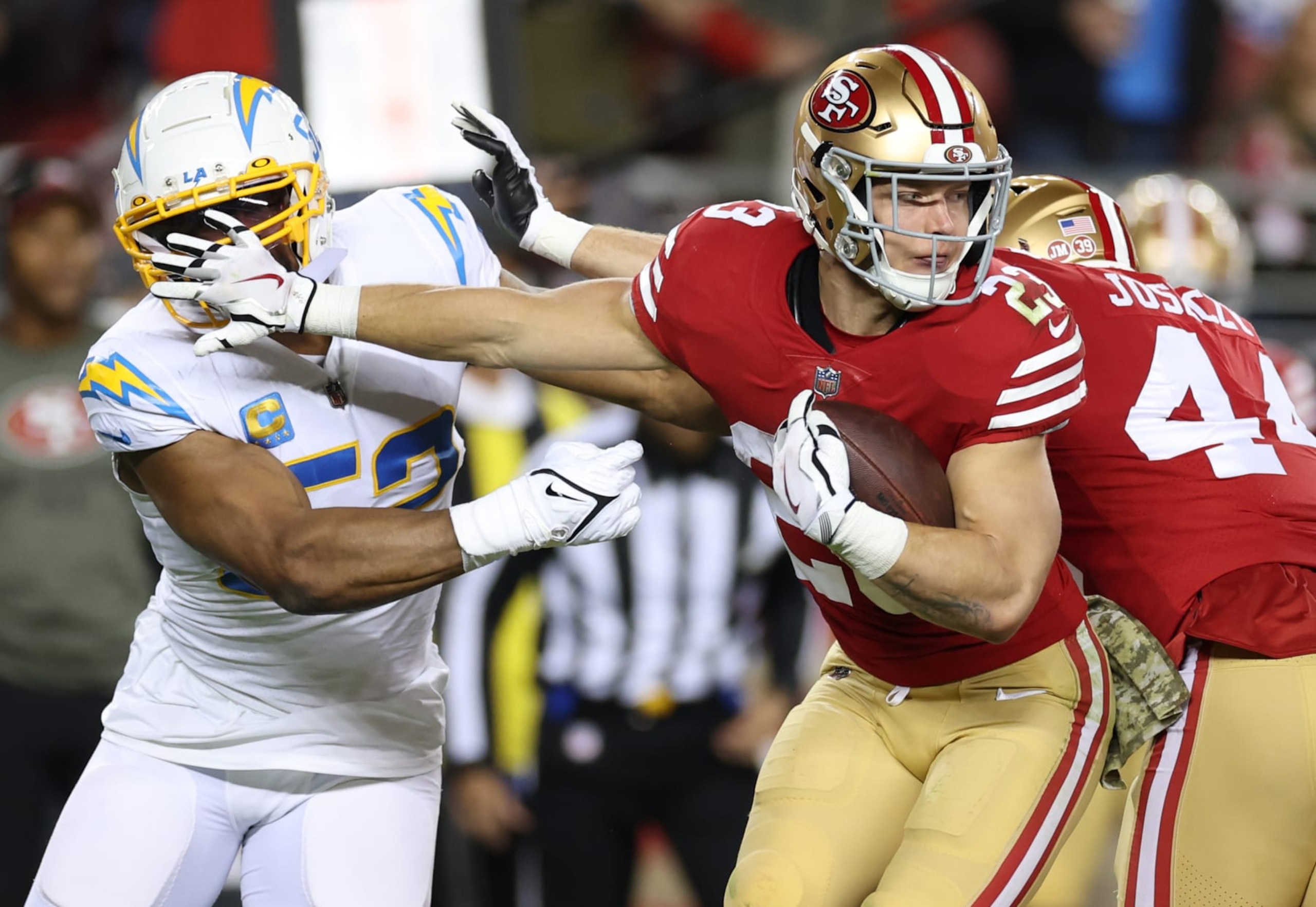 SANTA CLARA, CALIFORNIA - NOVEMBER 13: Christian McCaffrey #23 of the San Francisco 49ers rushes during the second quarter against the Los Angeles Chargers at Levi's Stadium on November 13, 2022 in Santa Clara, California. (Photo by Ezra Shaw/Getty Images) SANTA CLARA, CALIFORNIA - NOVEMBER 13: Christian McCaffrey #23 of the San Francisco 49ers rushes during the second quarter against the Los Angeles Chargers at Levi's Stadium on November 13, 2022 in Santa Clara, California. (Photo by Ezra Shaw/Getty Images)