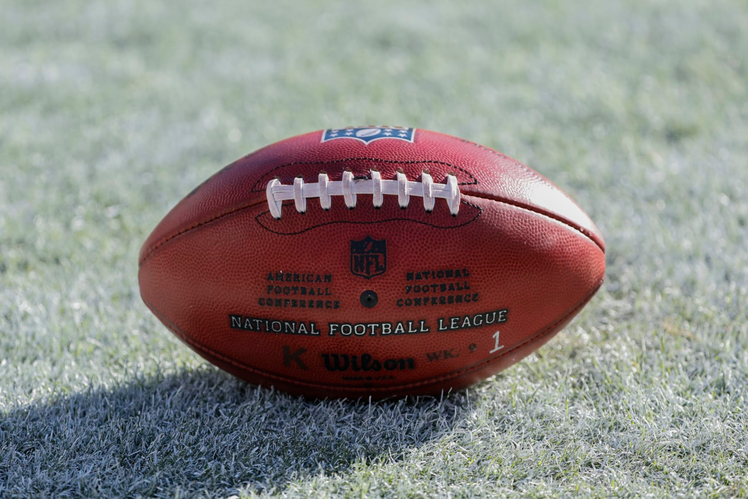 Wilson football sits on the field during the second half of an NFL football game between the Chicago Bears and Miami Dolphins, Sunday, Nov. 6, 2022, in Chicago. (AP Photo/Kamil Krzaczynski)