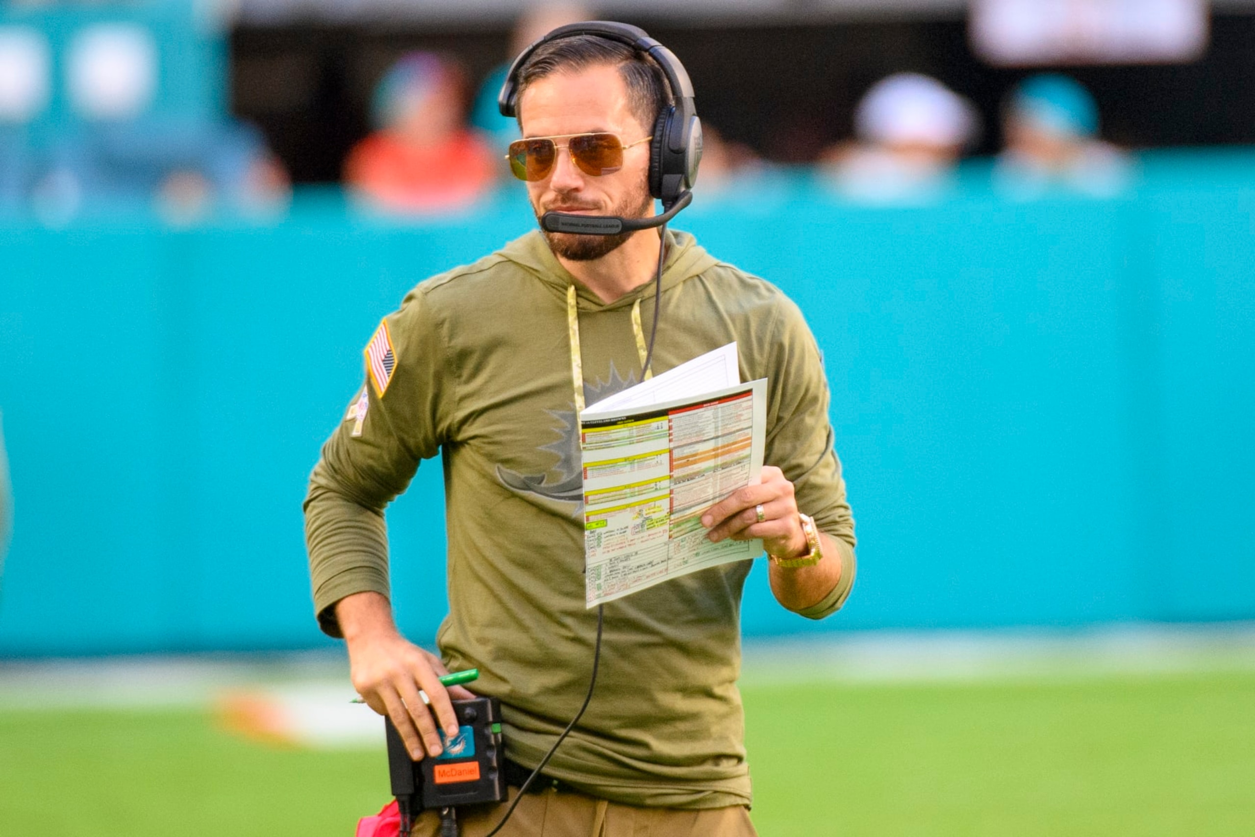 Miami Dolphins head coach Mike McDaniel stands on the field during an NFL football game against the Cleveland Browns, Sunday, Nov. 13, 2022, in Miami Gardens, Fla. (AP Photo/Doug Murray) Miami Dolphins head coach Mike McDaniel stands on the field during an NFL football game against the Cleveland Browns, Sunday, Nov. 13, 2022, in Miami Gardens, Fla. (AP Photo/Doug Murray)