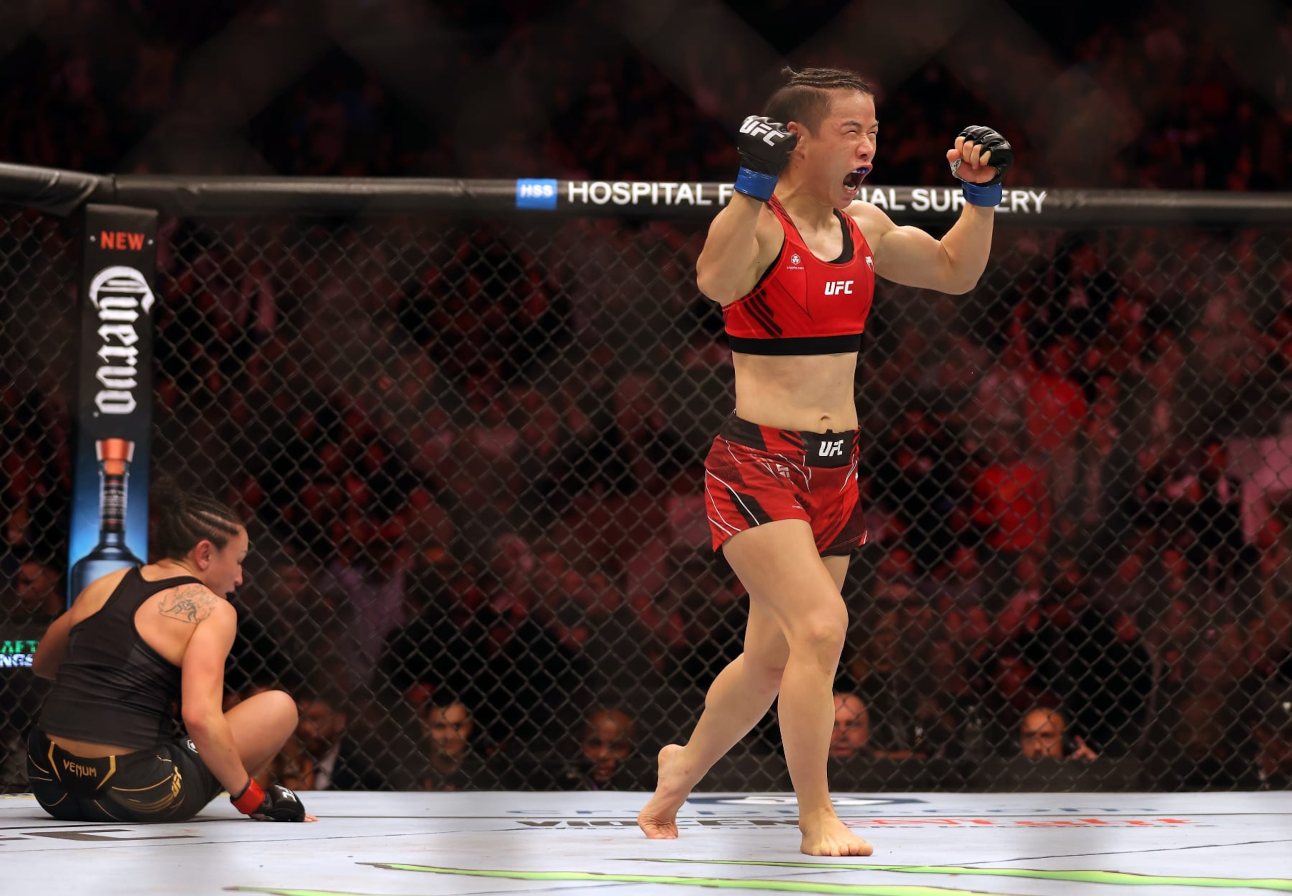 Zhang Weili celebrates a win over Carla Esparza. Zhang Weili celebrates a win over Carla Esparza.