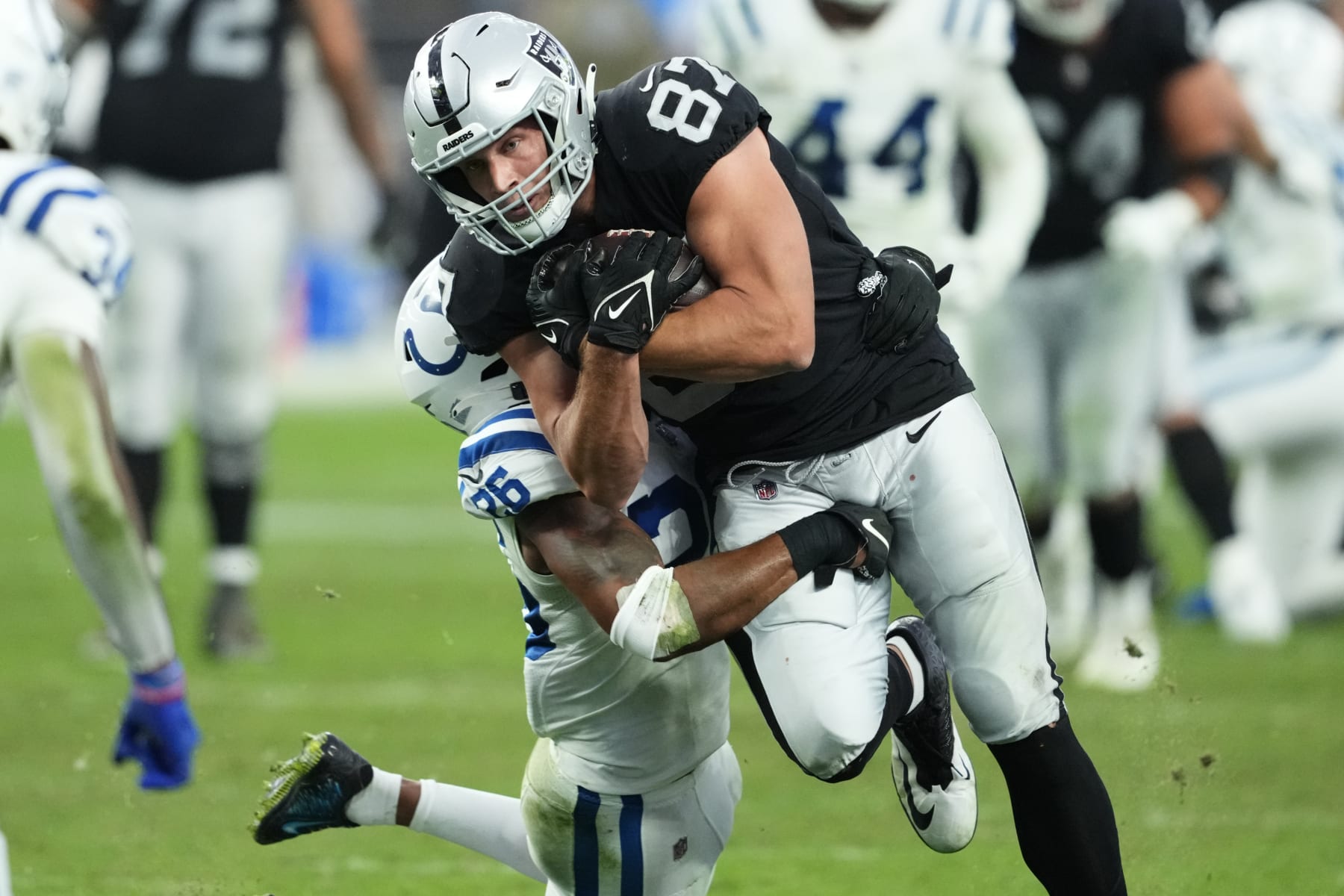 Las Vegas Raiders tight end Foster Moreau (87) runs the ball against the Indianapolis Colts during an NFL football game, Sunday, Nov. 13, 2022, in Las Vegas. (AP Photo/Matt York)