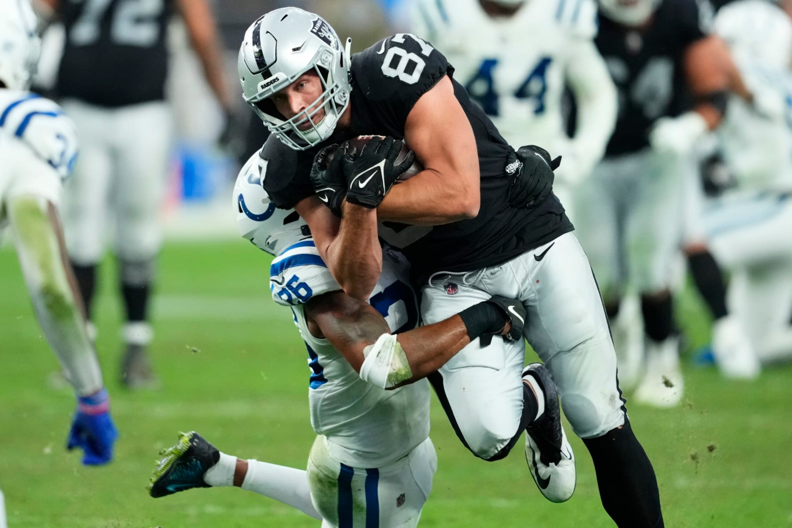 Las Vegas Raiders tight end Foster Moreau (87) runs the ball against the Indianapolis Colts during an NFL football game, Sunday, Nov. 13, 2022, in Las Vegas. (AP Photo/Matt York) Las Vegas Raiders tight end Foster Moreau (87) runs the ball against the Indianapolis Colts during an NFL football game, Sunday, Nov. 13, 2022, in Las Vegas. (AP Photo/Matt York)