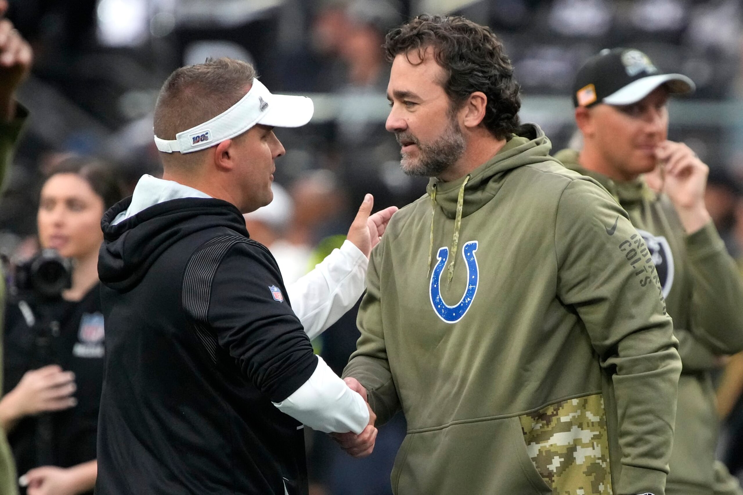 Las Vegas Raiders head coach Josh McDaniels and Indianapolis Colts head coach Jeff Saturday talk before an NFL football game, Sunday, Nov 13, 2022, in Las Vegas. (AP Photo/Rick Scuteri) Las Vegas Raiders head coach Josh McDaniels and Indianapolis Colts head coach Jeff Saturday talk before an NFL football game, Sunday, Nov 13, 2022, in Las Vegas. (AP Photo/Rick Scuteri)